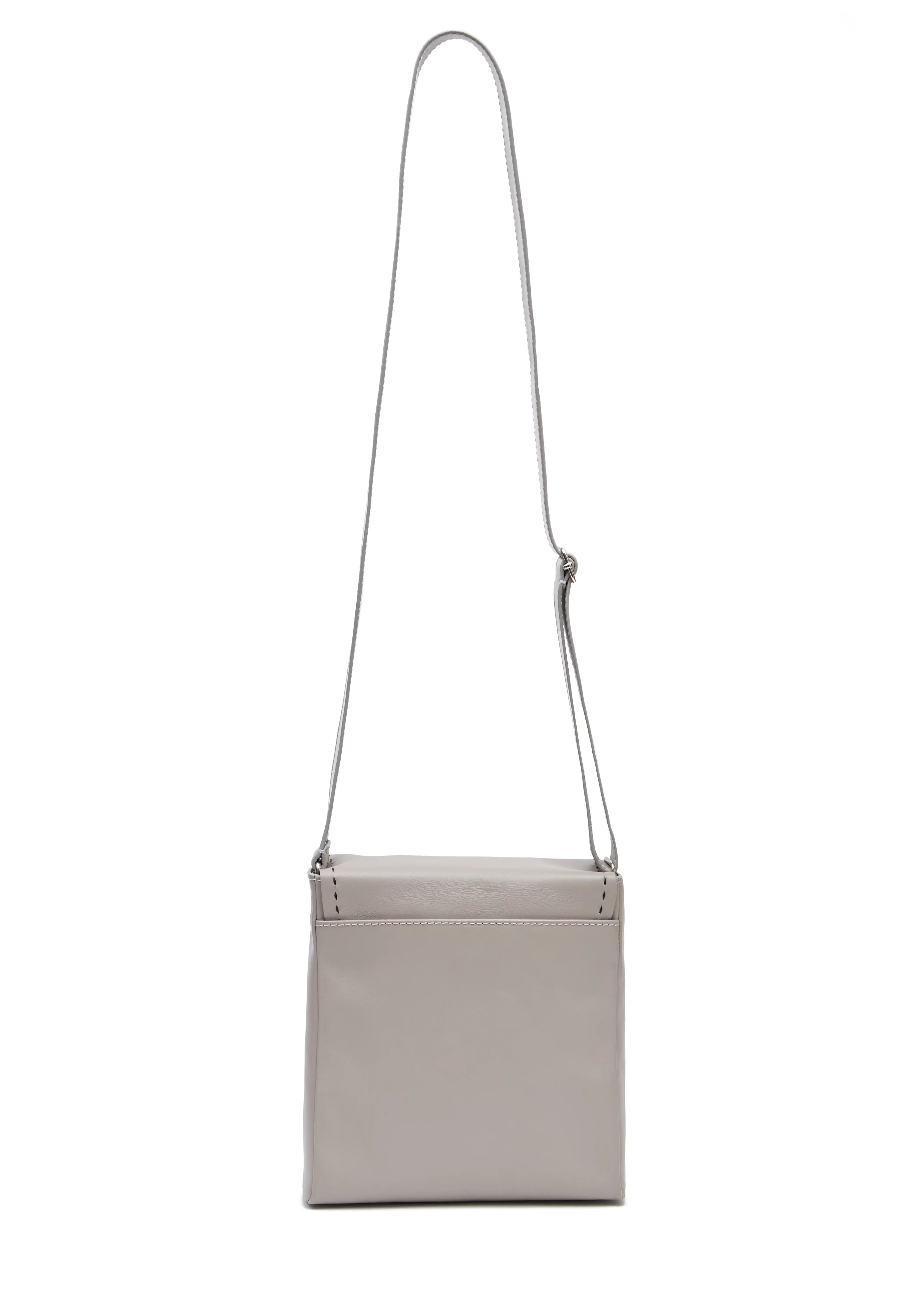 Back view of the Philini Anastasia Messenger Bag in taupe aniline nappa leather, square shape with adjustable leather strap. Premium structured leather handbag, minimalist and elegant for everyday or work use