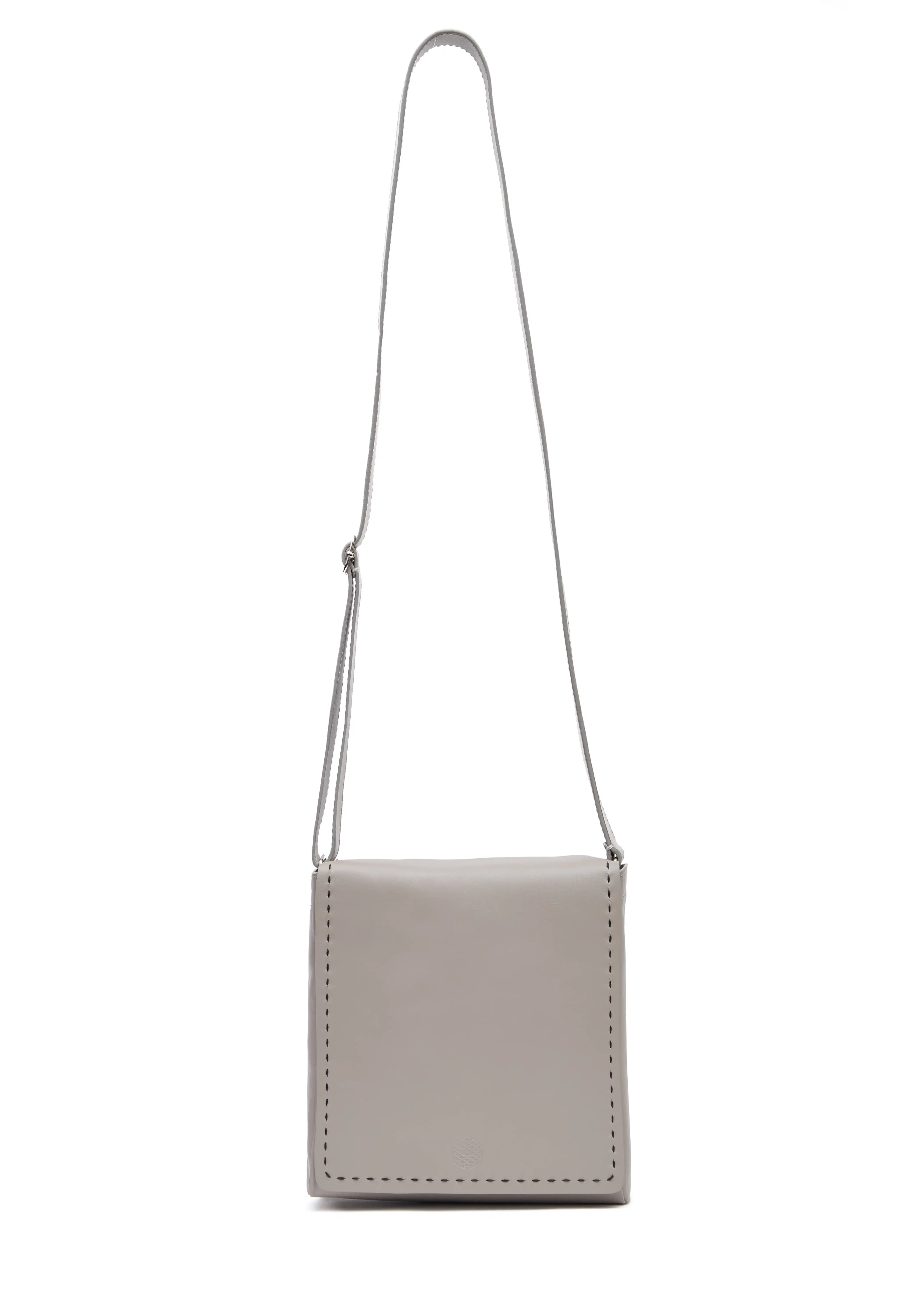 Front view of the Philini Anastasia Messenger Bag in taupe aniline nappa leather, square shape with full-flap front, perimeter hand-stitching, and adjustable leather strap. Premium handcrafted leather handbag, minimalist and elegant for everyday or work use.