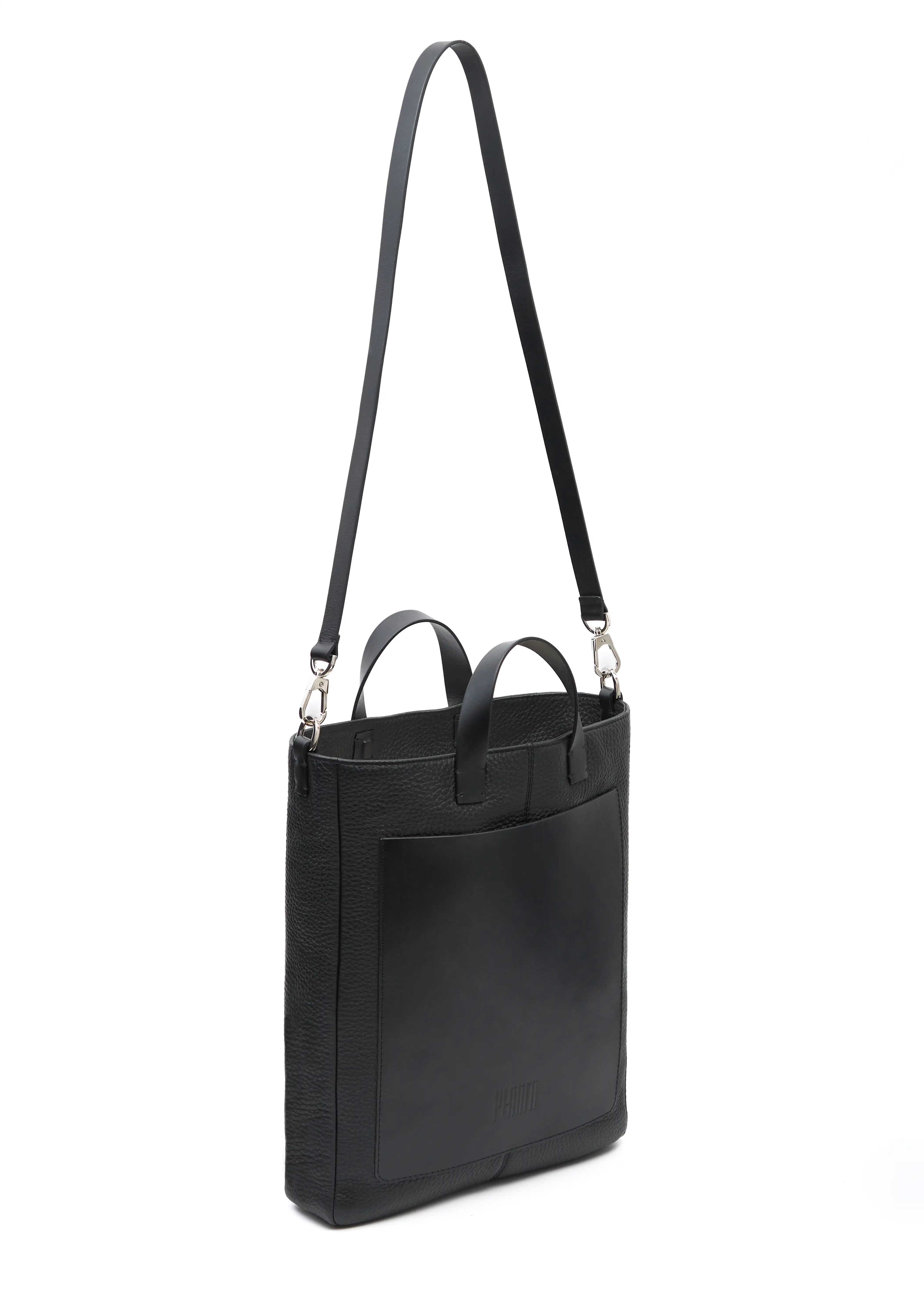 Philini Andrea Bag in Black – A luxurious handmade leather tote bag for women, crafted from premium full-grain and buffalo European leather. This timeless and sustainable design features a sleek silhouette, detachable shoulder strap, and elegant craftsmanship. Perfect for modern, ethical fashion enthusiasts