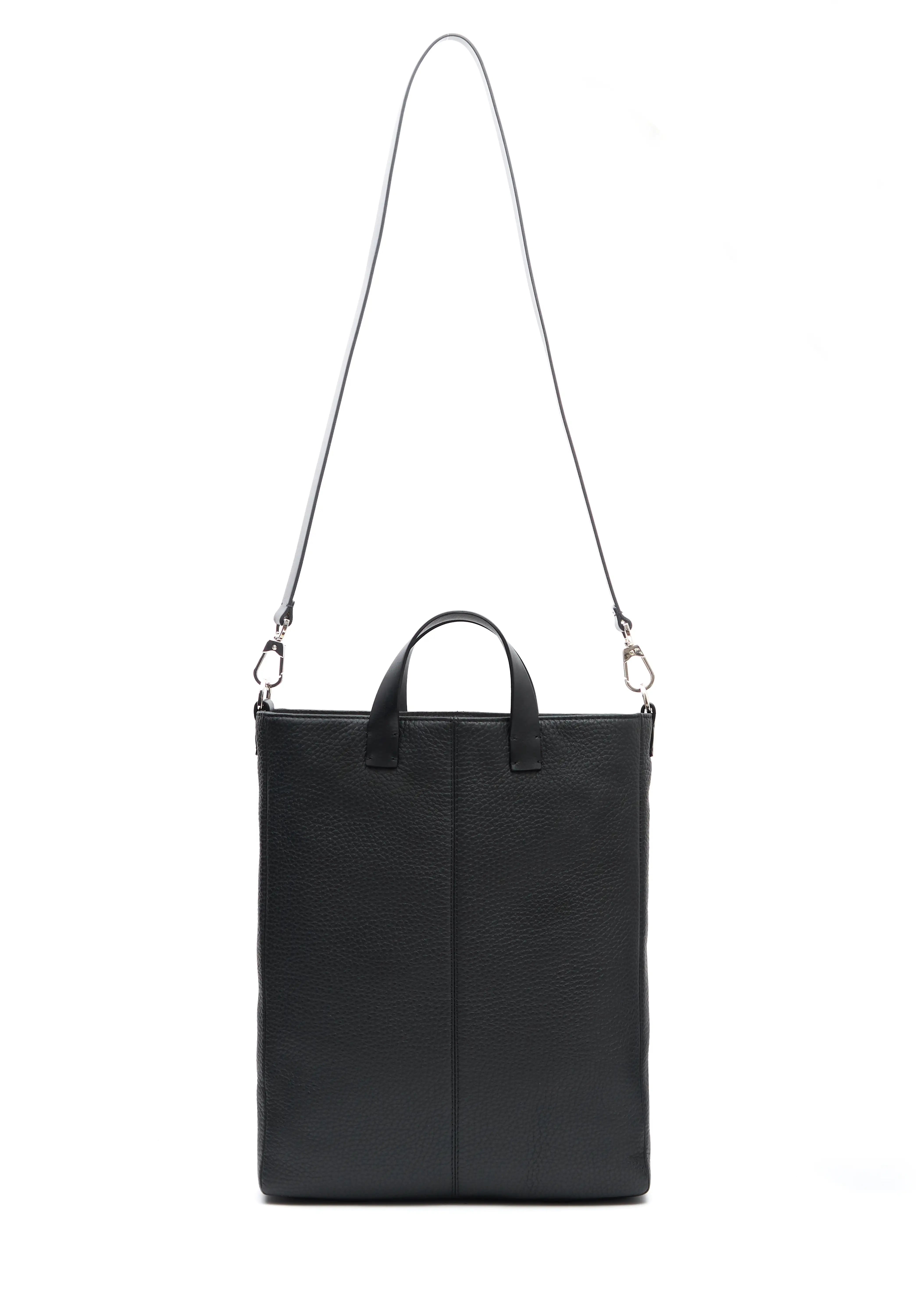 Philini Andrea handcrafted black leather tote bag with a minimalist and elegant design, featuring premium full-grain European leather, durable top handles, and an adjustable shoulder strap. Ethically made-to-order by skilled artisans in small batches, this sustainable tote is perfect for modern women seeking timeless style and functionality. Available exclusively on Philini.com.