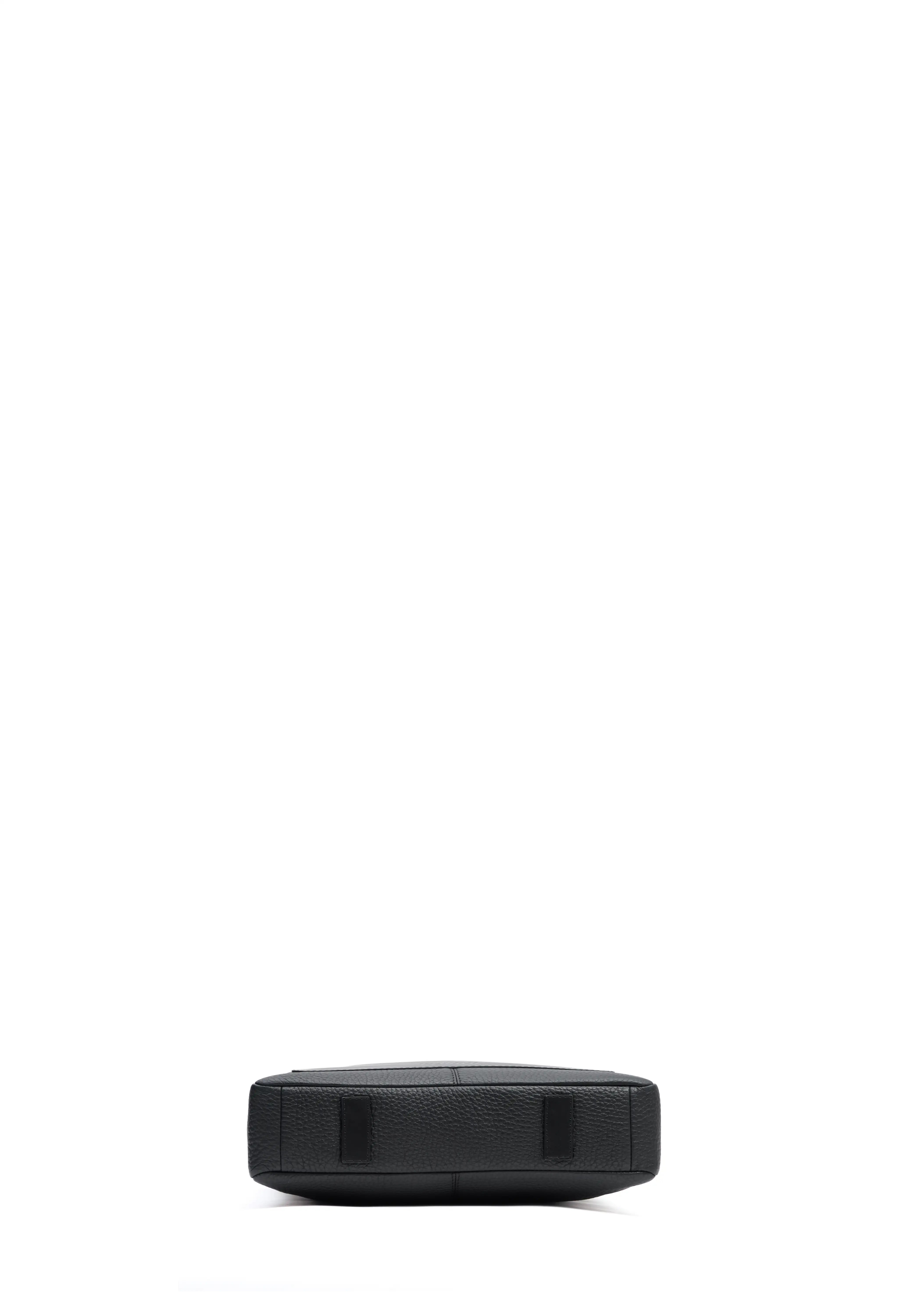 Bottom view of the Philini Andrea Bag in Black – A luxurious handmade leather tote bag crafted from premium full-grain and buffalo European leather. Has two small leather pads as its bottom feet. Ethically made for women who value sustainability and exclusivity.