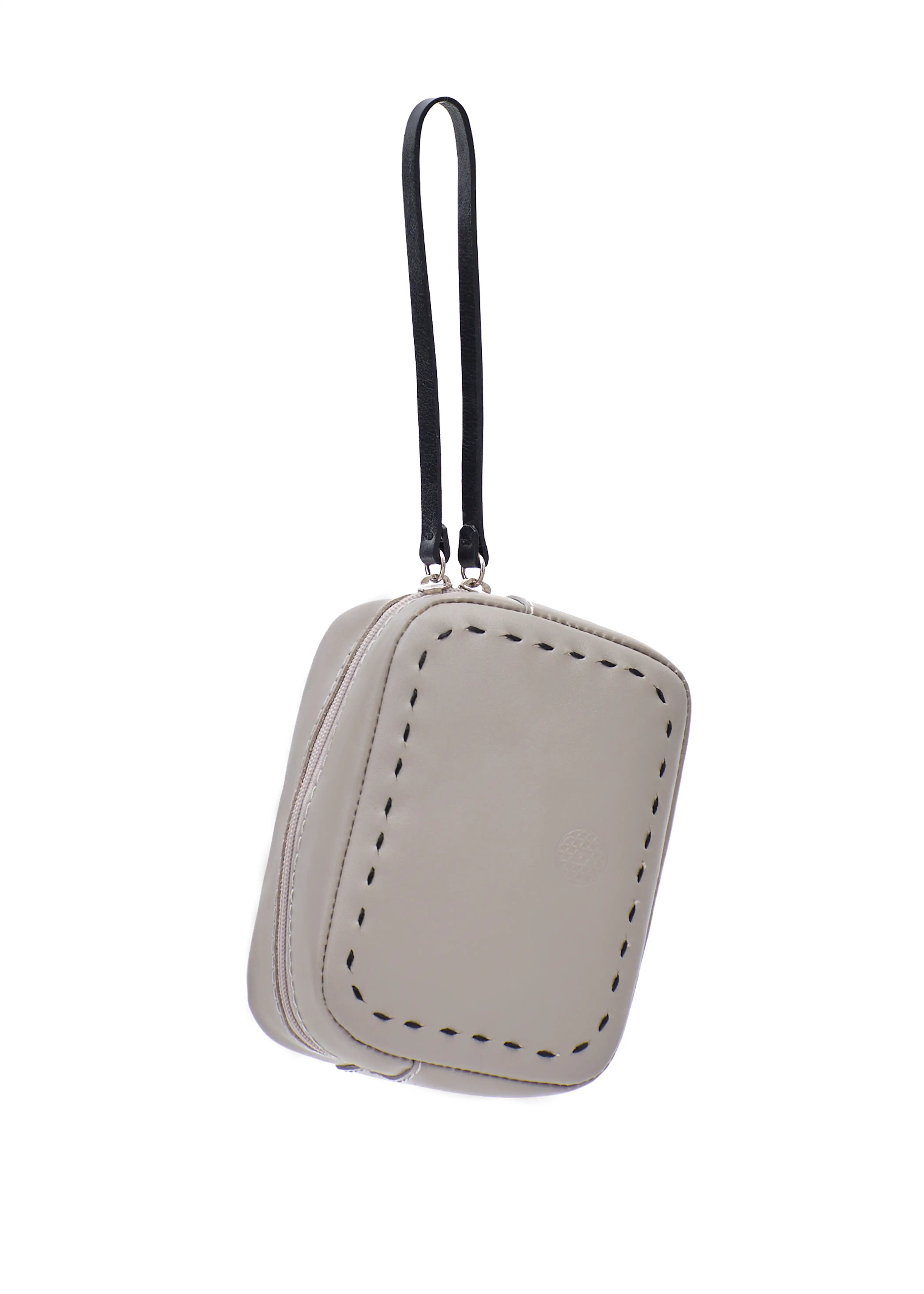 Close front view of the Philini Anny taupe aniline leather cosmetic bag, boxy design with visible hand stitching and zip closure. Stylish minimalist travel accessory