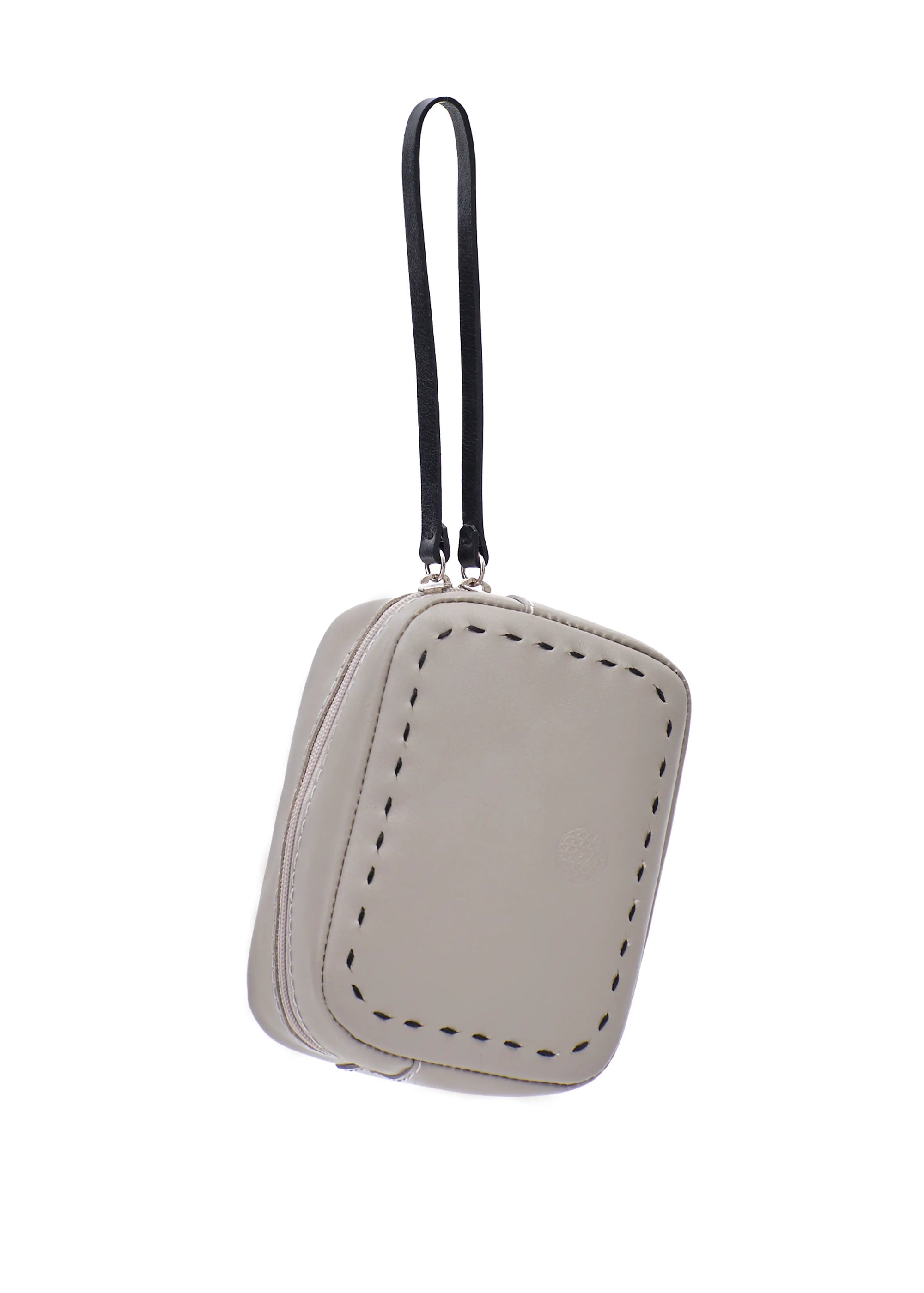 Close front view of the Philini Anny taupe aniline leather cosmetic bag, boxy design with visible hand stitching and zip closure. Stylish minimalist travel accessory