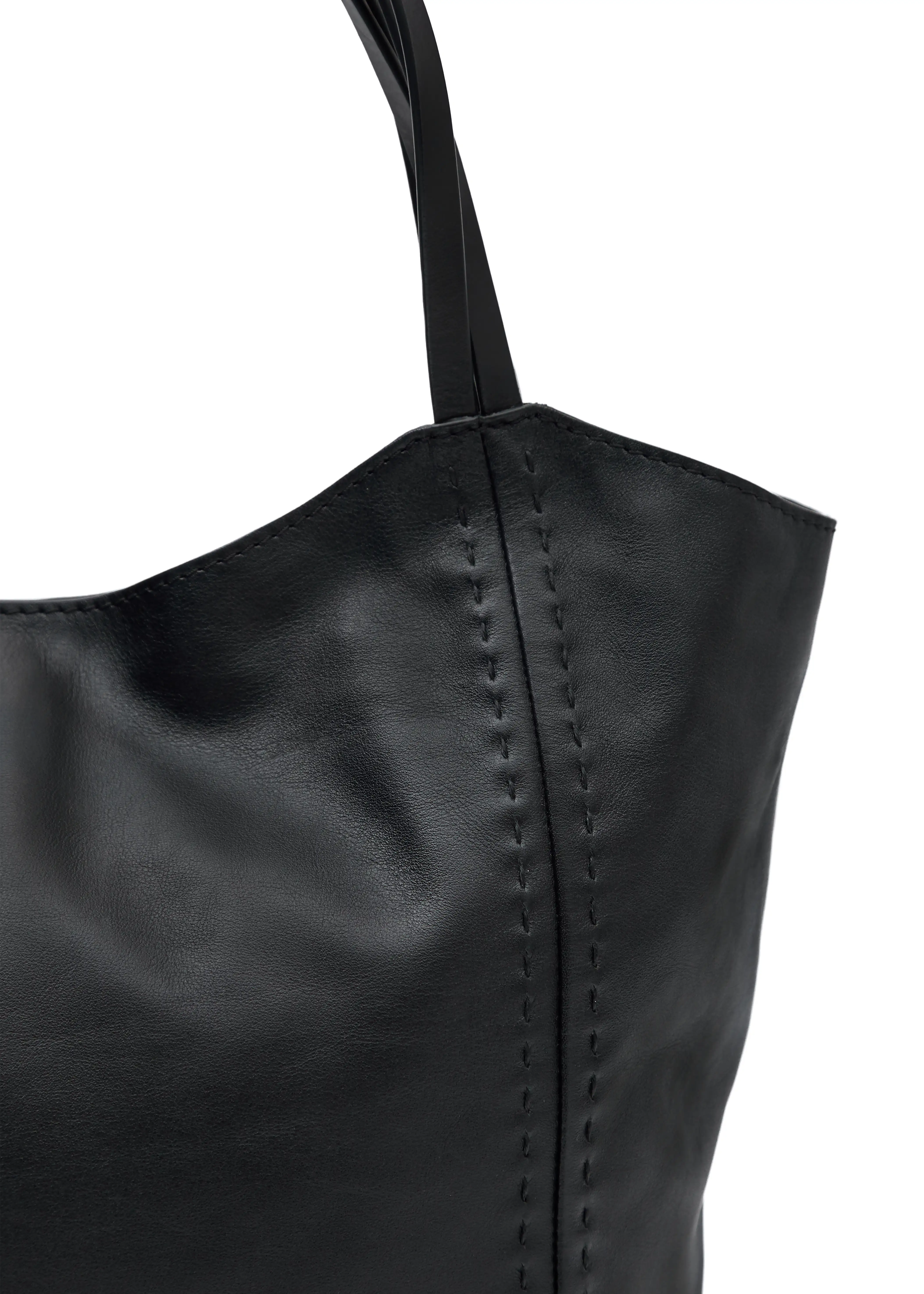 Close front view of the Philini Charlotte Tote Bag in black aniline calf leather, showing double flat handles and refined tonal stitching. Premium black leather tote, minimalist and durable