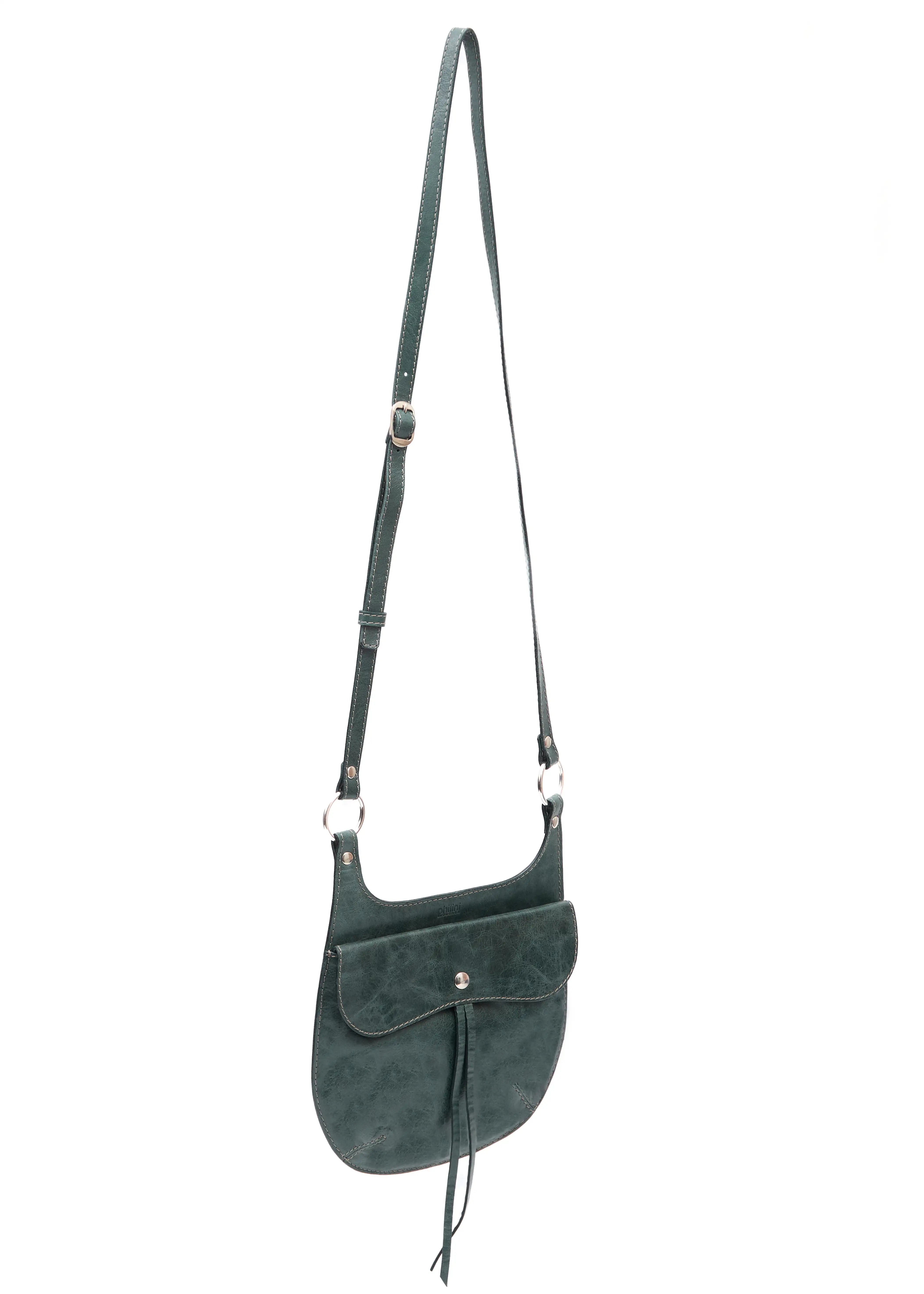 Side view of the Philini Cowboy Crossbody Bag in dark green calf leather, curved saddle shape with structured flap and snap closure. Stylish handcrafted leather shoulder bag