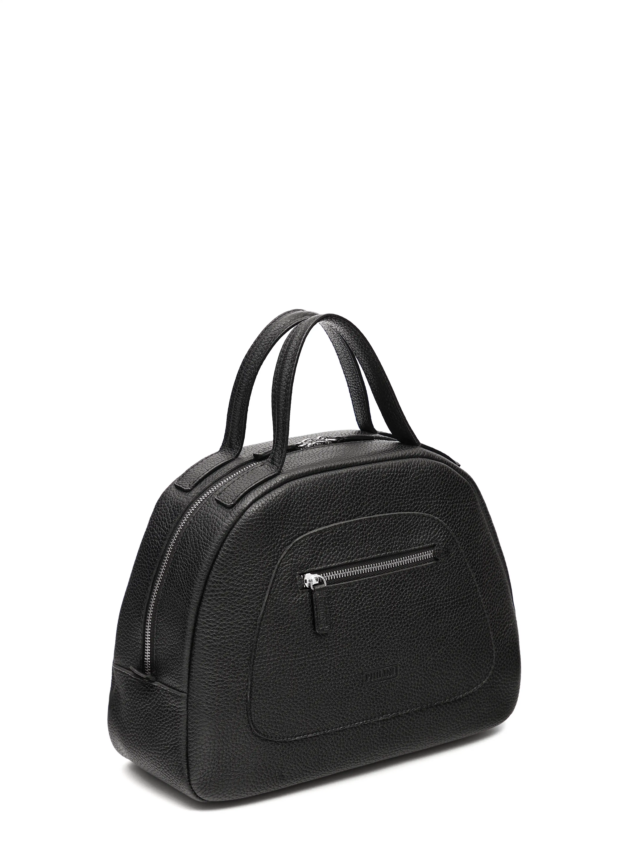 Side 3/4 view of the Philini Domi Black dome-shaped handbag, handcrafted from premium buffalo leather. Features include a front zip pocket, short handles, and silver rivet and zipper details. A sustainable, eco-conscious luxury accessory and timeless wardrobe essential.