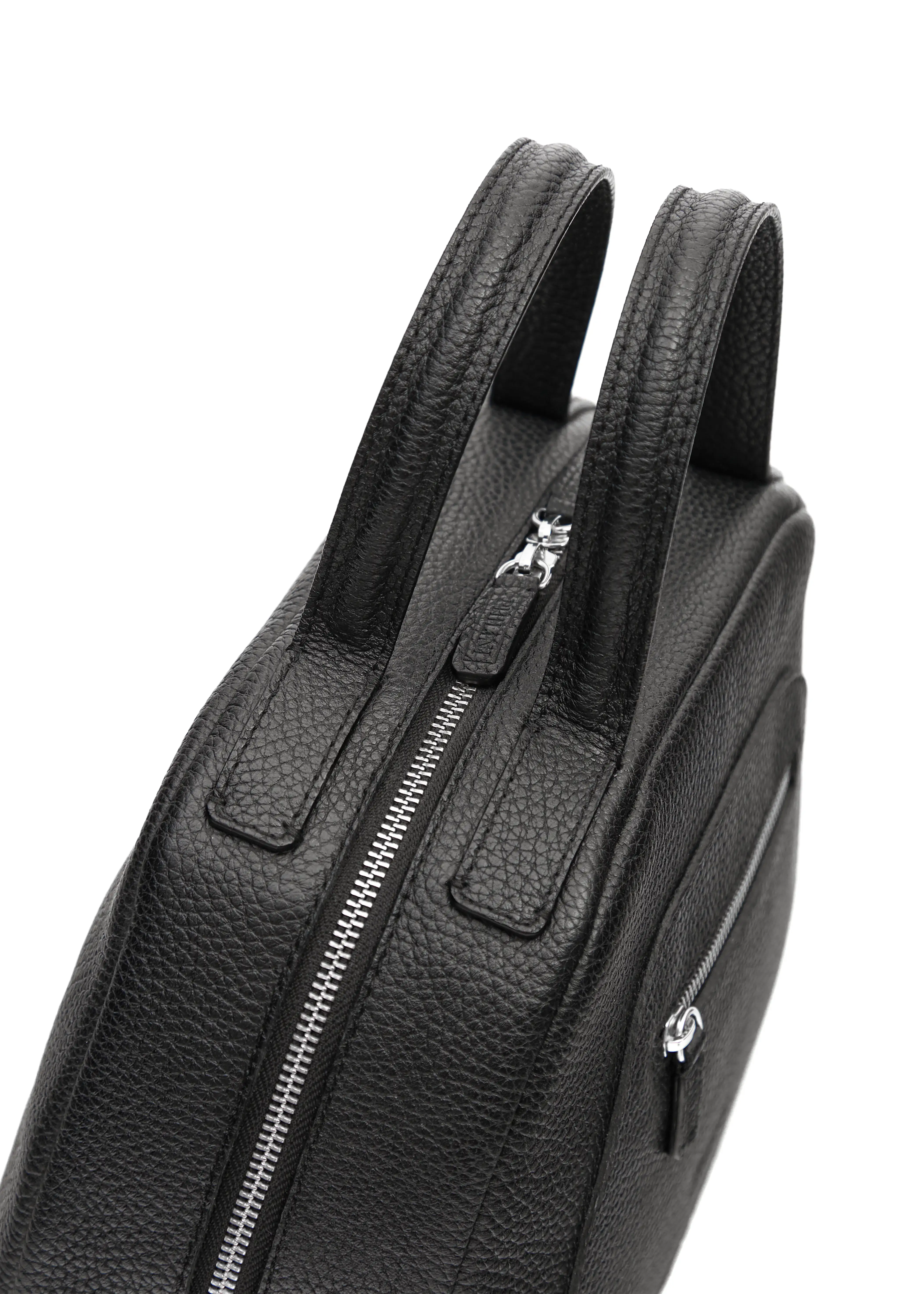 Top view of the Philini Domi Black Dome Handbag, crafted from premium buffalo leather with silver rivets, a sleek zipper, and short leather handles. This minimalist leather bag is perfect for elegant style.