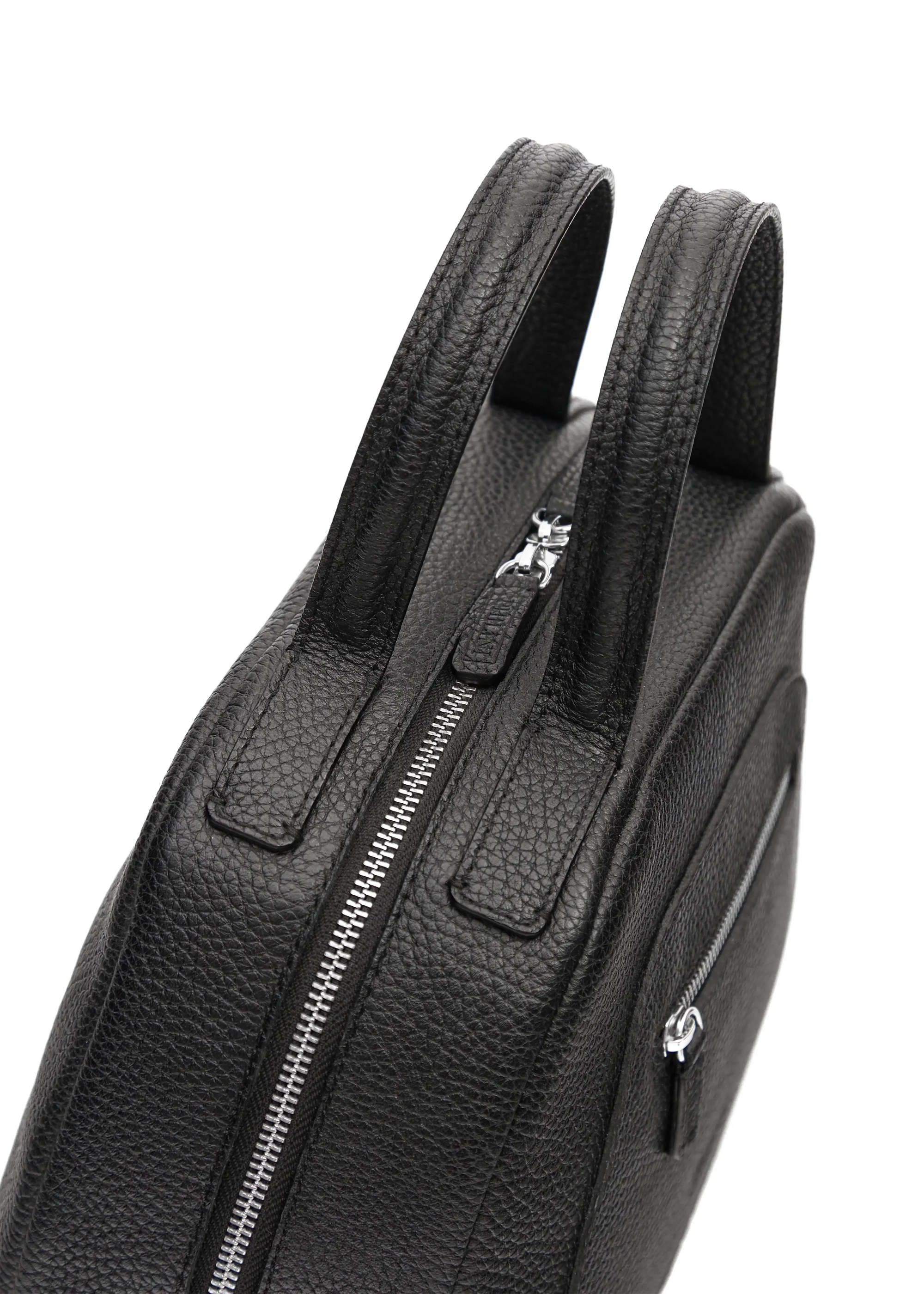 Top view of the Philini Domi Black Dome Handbag, crafted from premium buffalo leather with silver rivets, a sleek zipper, and short leather handles. This minimalist leather bag is perfect for elegant style.