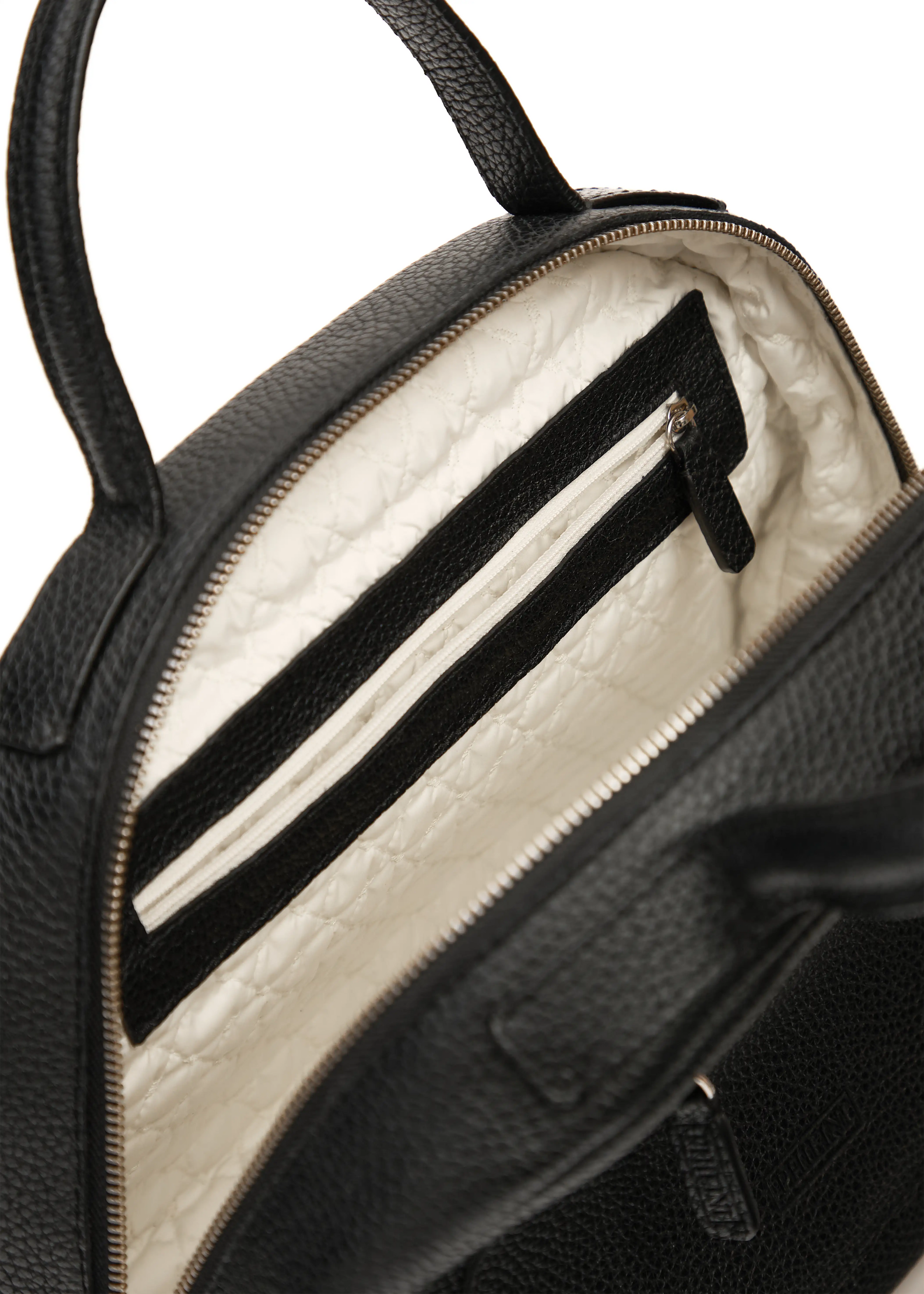 Interior view of the Philini Domi Black Dome Handbag, handcrafted from buffalo leather and finished with short leather handles, silver rivets, and a zipper closure. The interior features a vanilla-colored lining and zippered inner pockets.