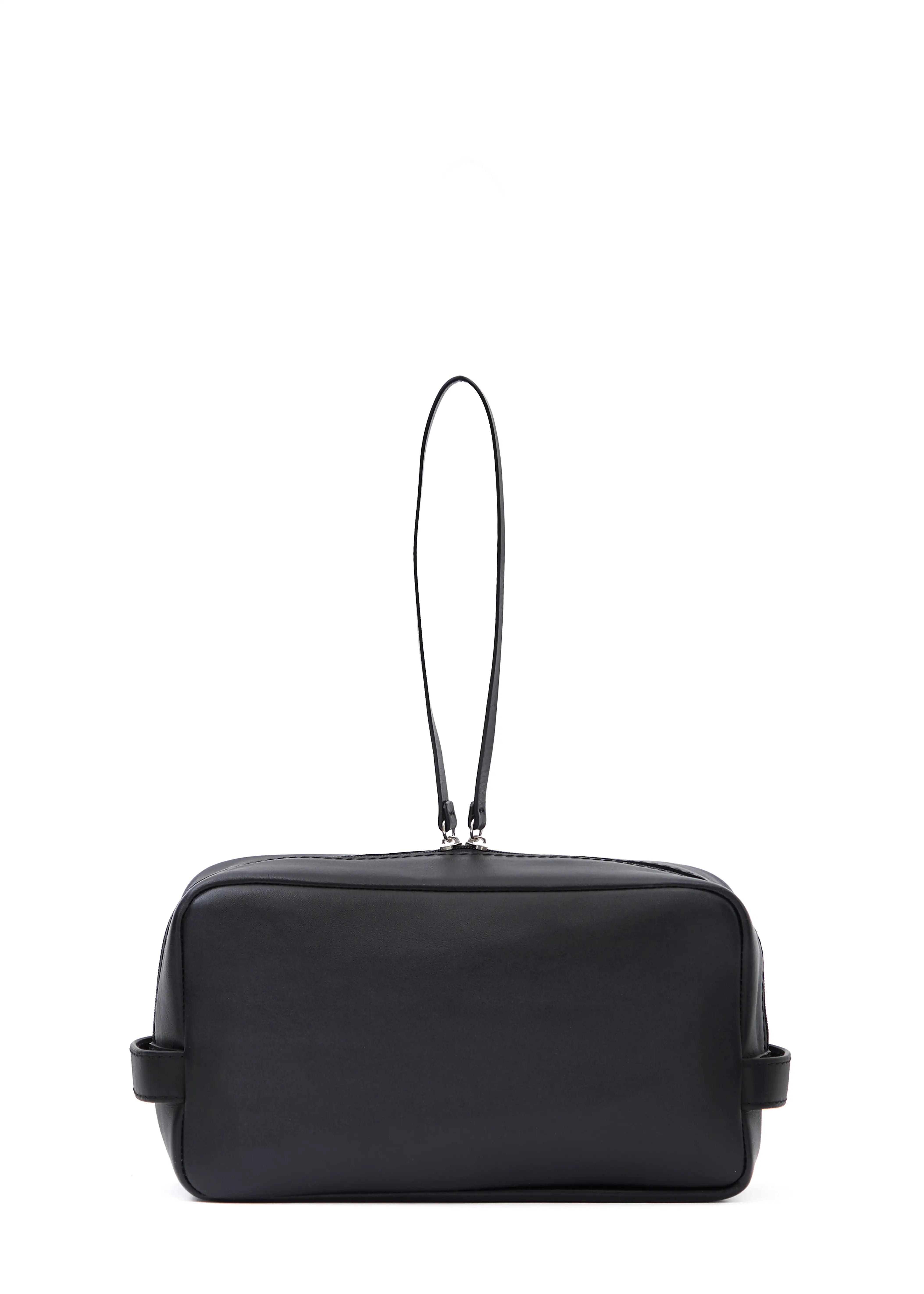 Close back view of the Philini Magdalena Pouch in black nappa leather, rectangular silhouette with two short handles and zip closure with leather pull. Modern black travel pouch