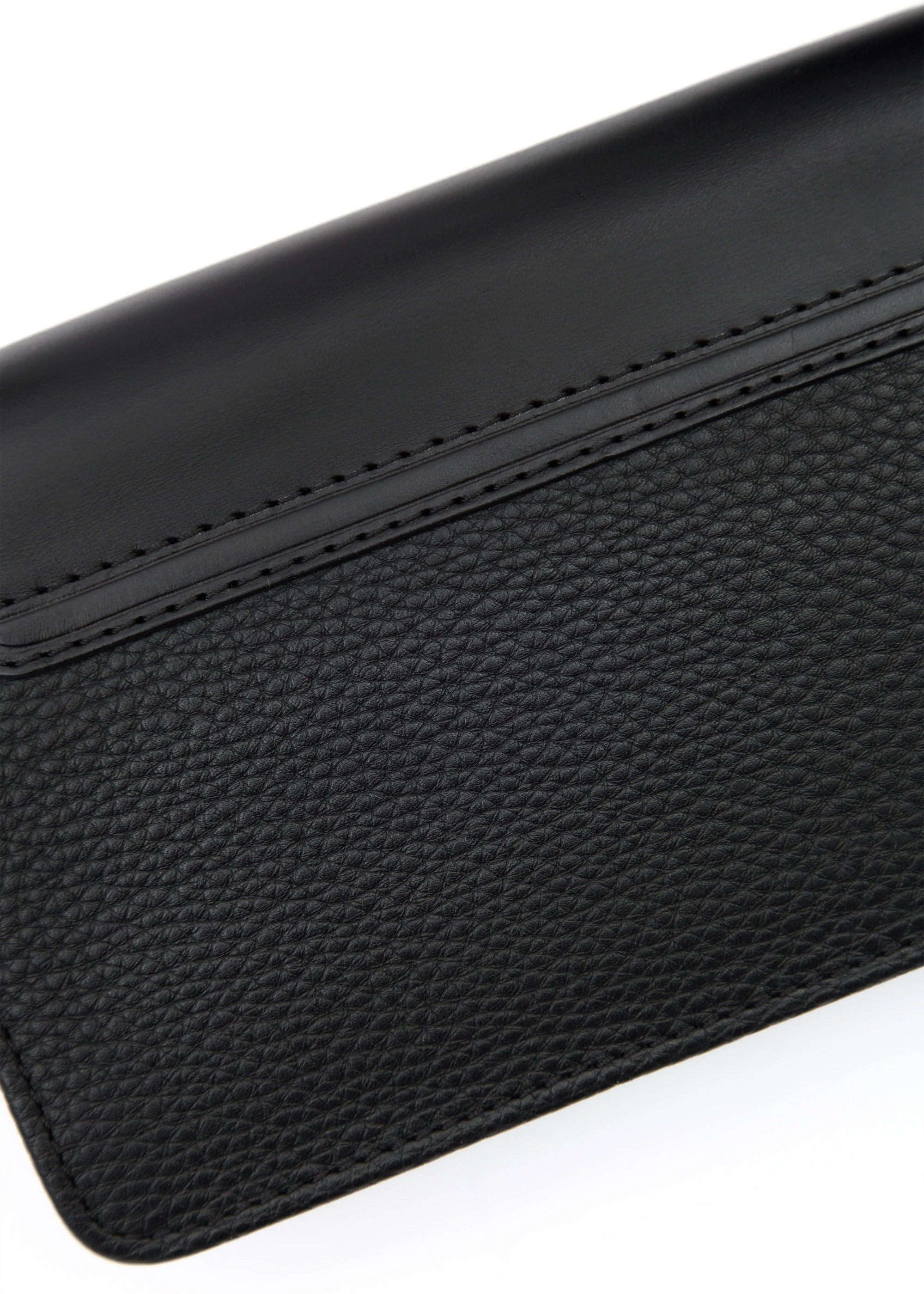 Closer look at the Mihaela Black bag, showing the high-quality full-grain leather flap combined with a buffalo leather back and visible stitching. A handcrafted leather piece.