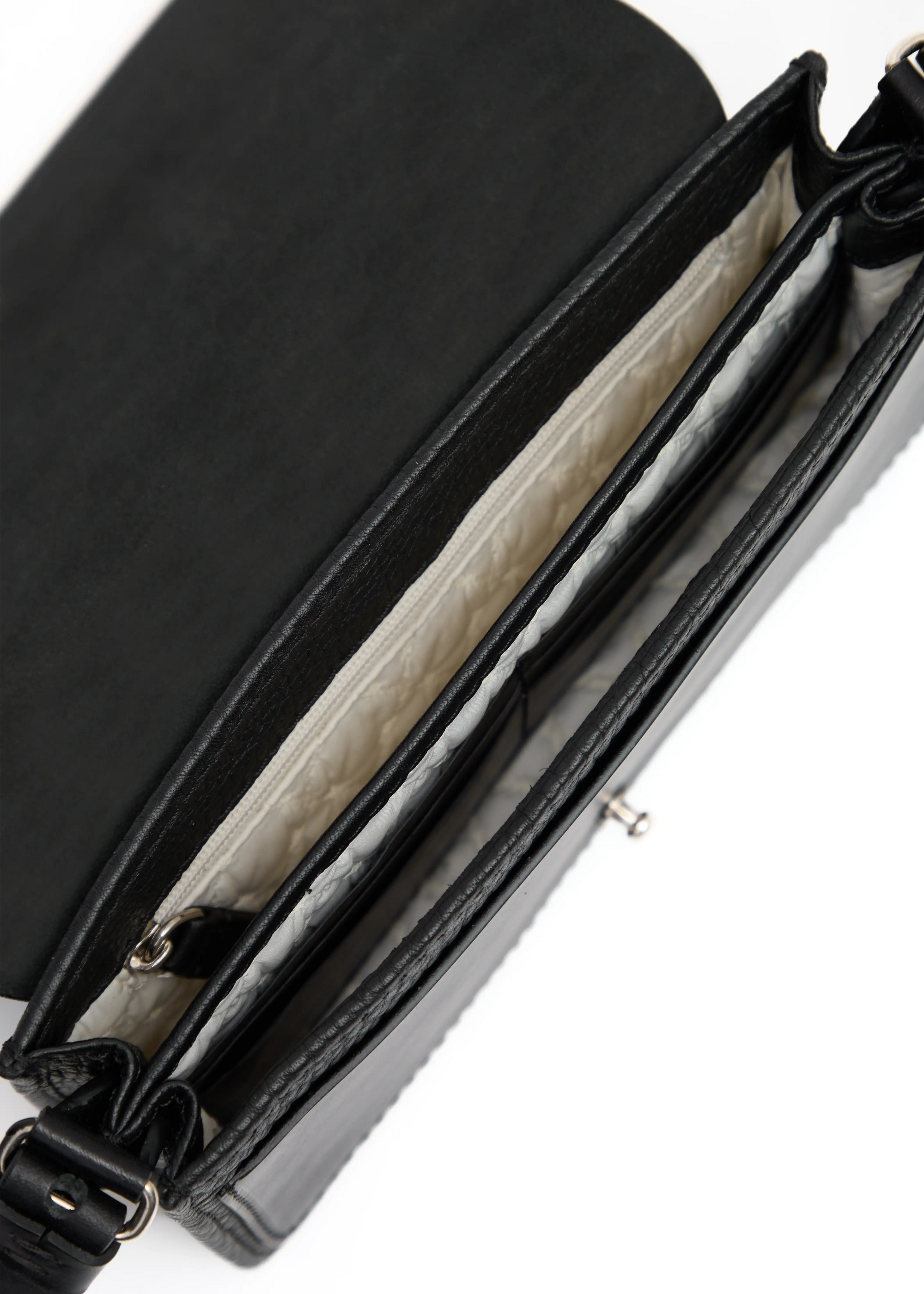 Close-up interior view of the Philini Mihaela Black Wallet Bag, showcasing a vanilla-colored fabric lining, 3 compartments including a flat leather pocket with a push button, six leather card slots, and a zippered pocket. A handcrafted, luxury handbag .