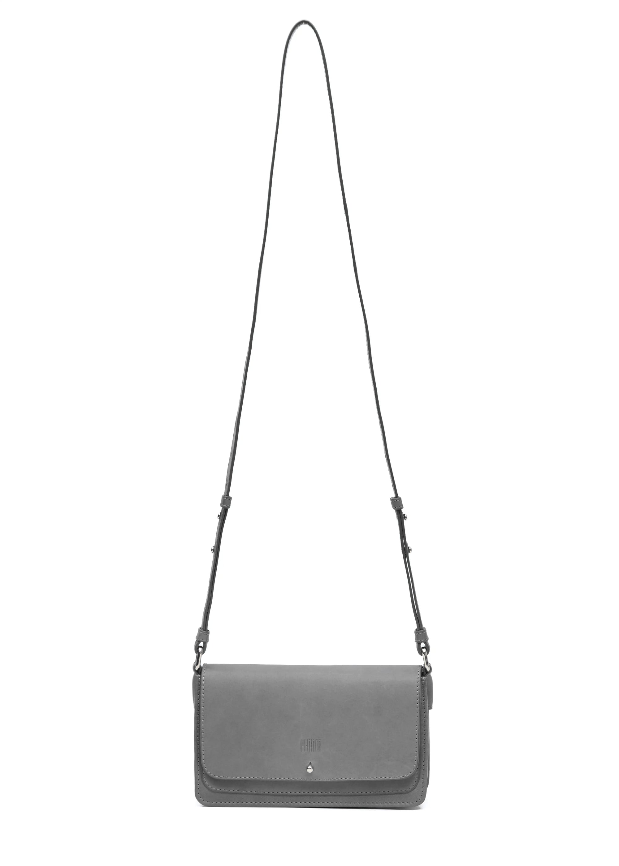 Front view of the Philini Mihaela Wallet Bag in grey Nappa leather, featuring a rectangular form, front flap with silver cufflink closure, and an adjustable leather strap with silver accents. This designer ladies wallet crossbody is a compact.
