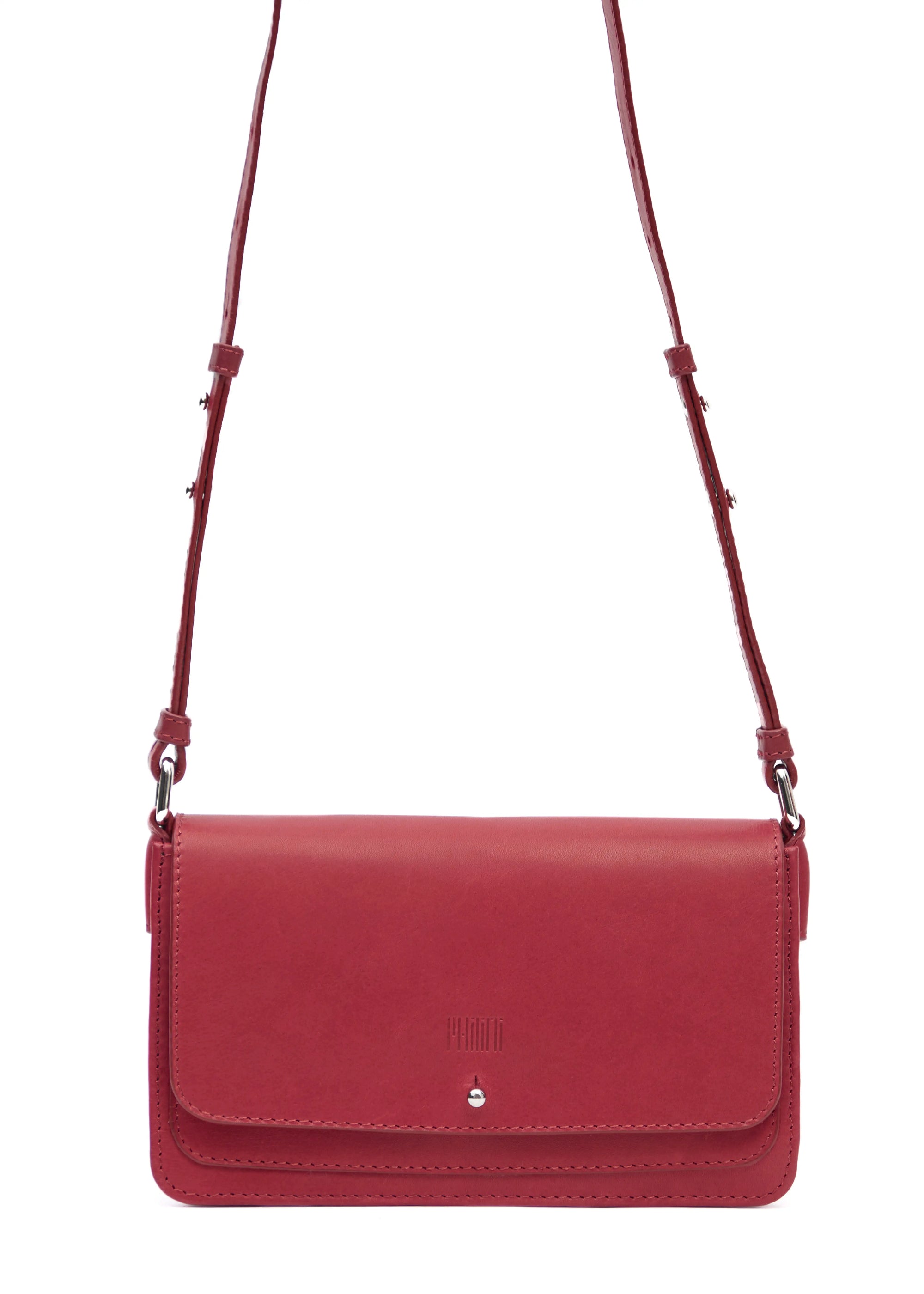 Close-up front view of the Philini Mihaela Wallet Bag in red Nappa leather, featuring a rectangular shape, front flap with silver cufflink closure, adjustable leather strap with silver accents, and a stamped logo. This minimalist wallet crossbody blends conscious luxury with timeless leather craftsmanship
