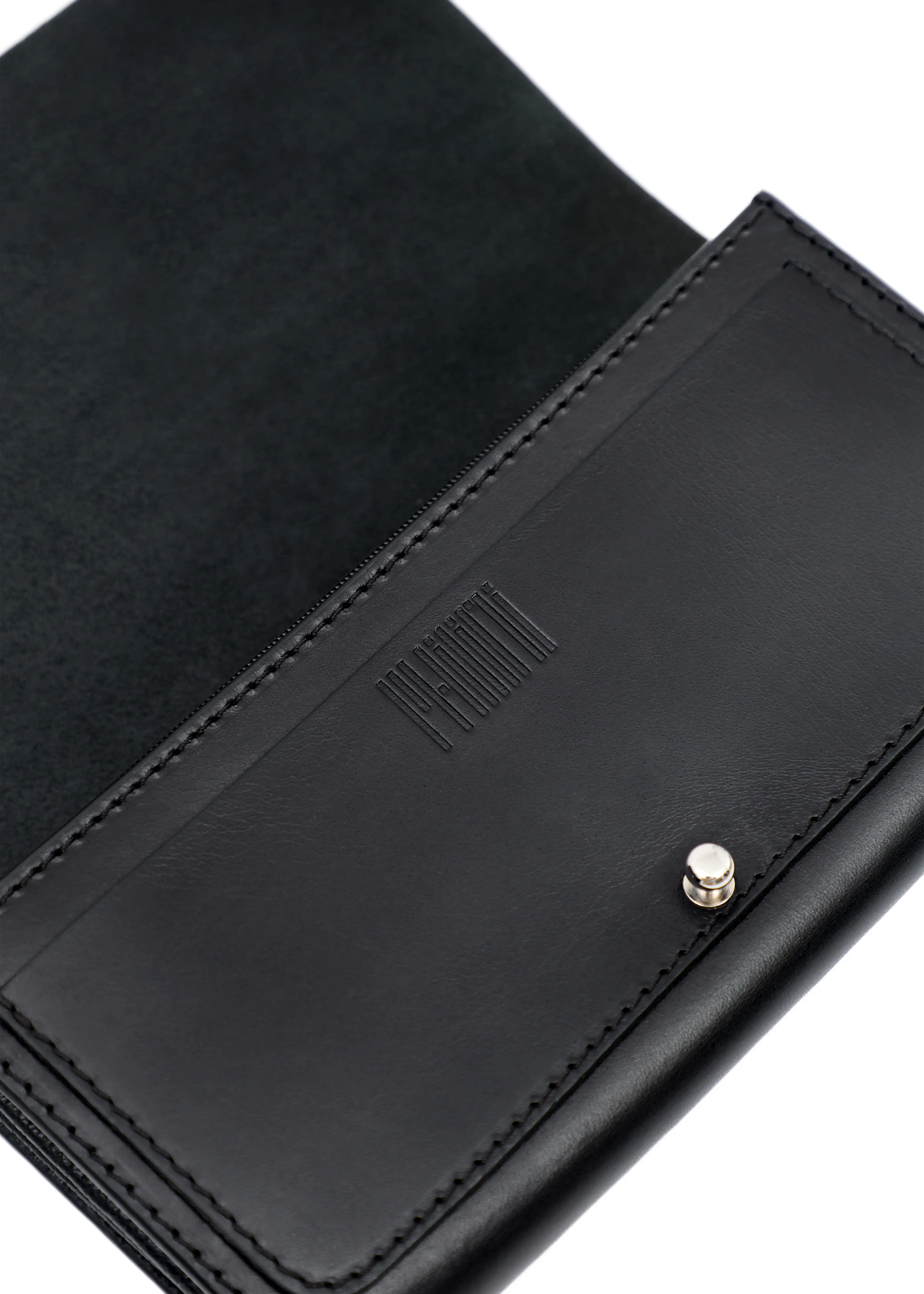 Front view of the open Philini Sandra Wallet in black full-grain leather with a stamped logo and silver cufflink closure. Premium women’s leather wallet with minimalist design