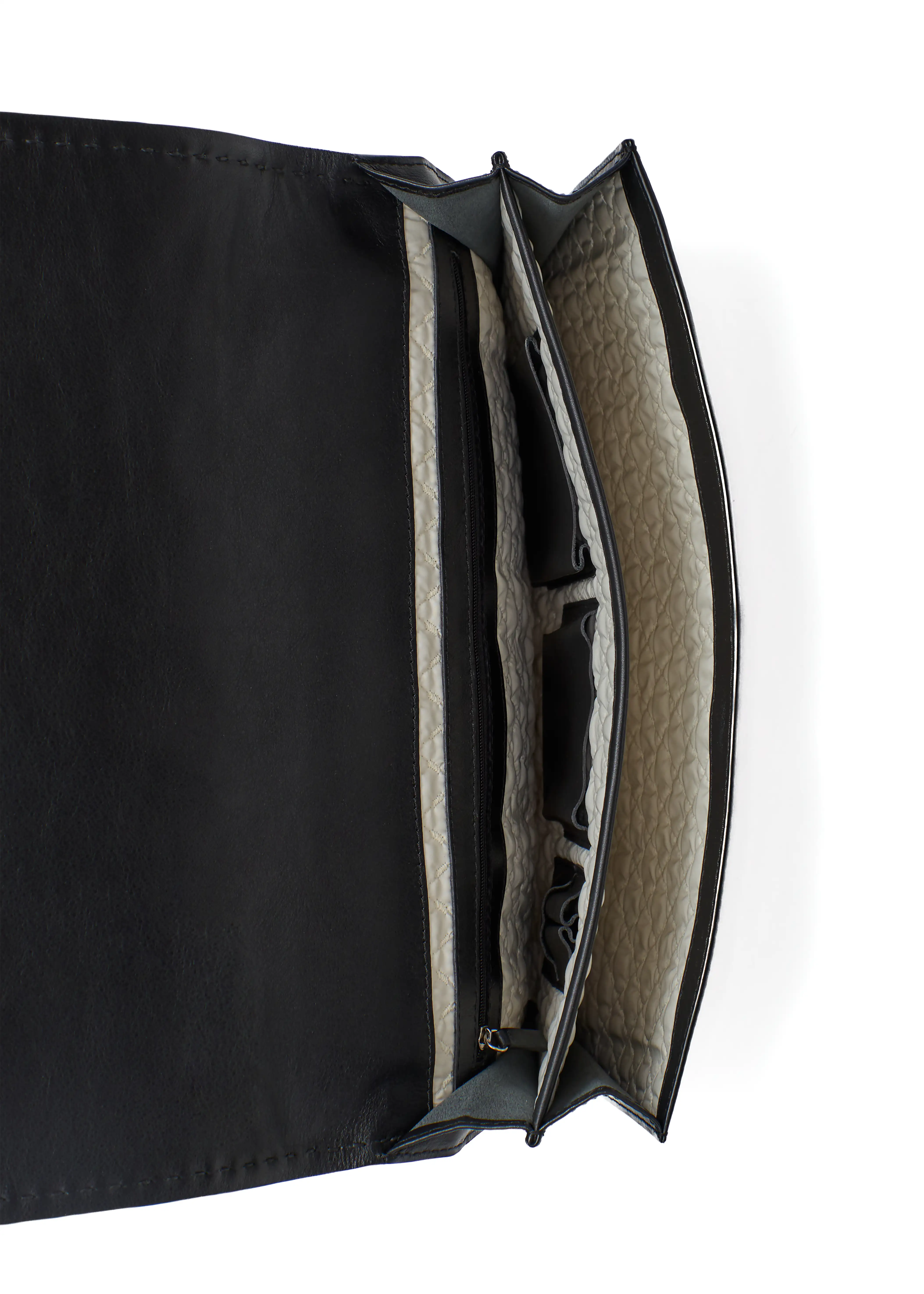Inside front view of the Philini Valery Business Clutch in black aniline nappa leather, showing open flap with two compartments: one side with open pocket, opposite side with zip pocket and leather trim. Leather organizer bag with phone and pen pockets