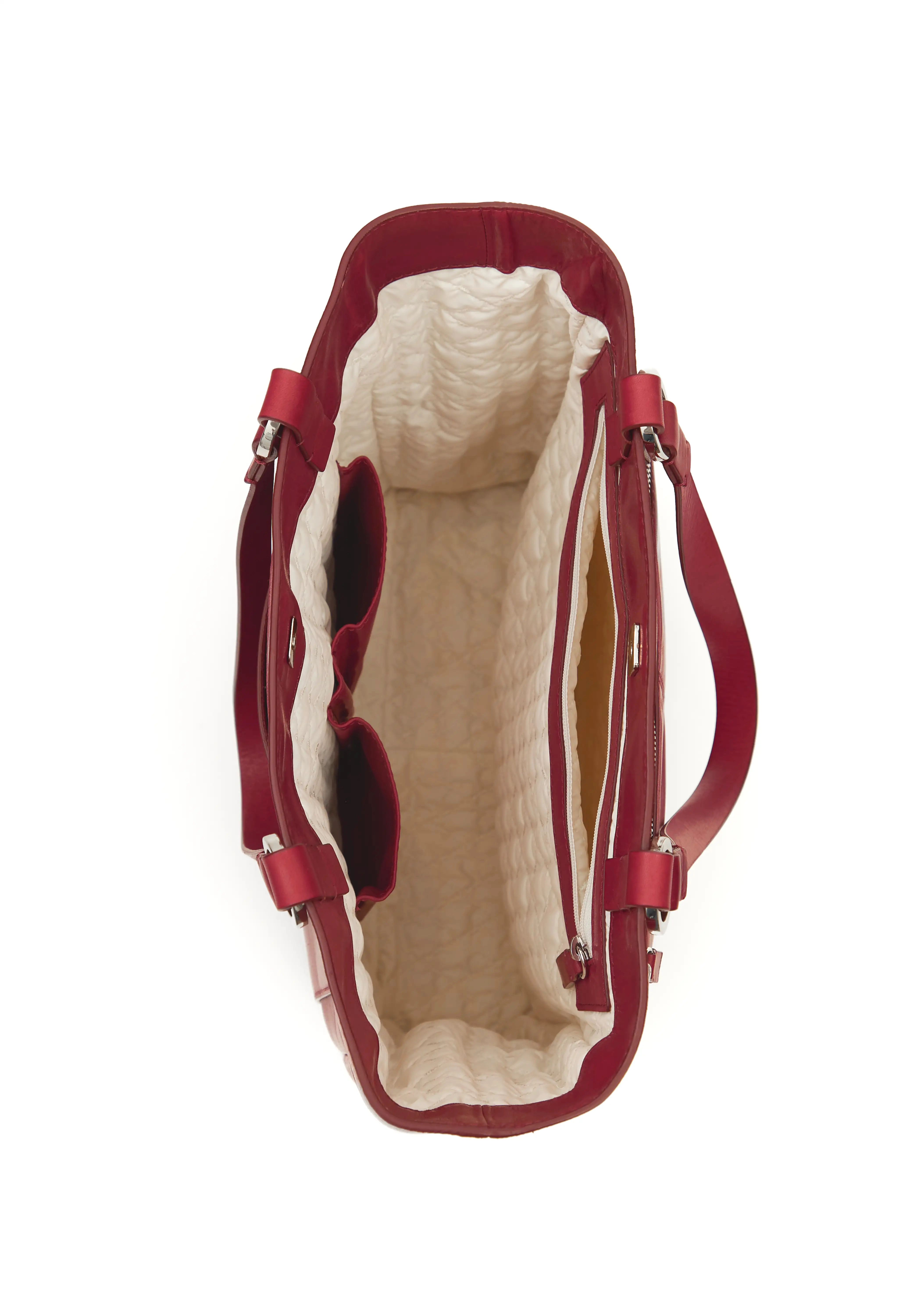 Interior view of the Philini Elena Red Tote Bag, big zipped pocket with vanilla-coloured lining and two smaller leather compartments, made of high-quality leather