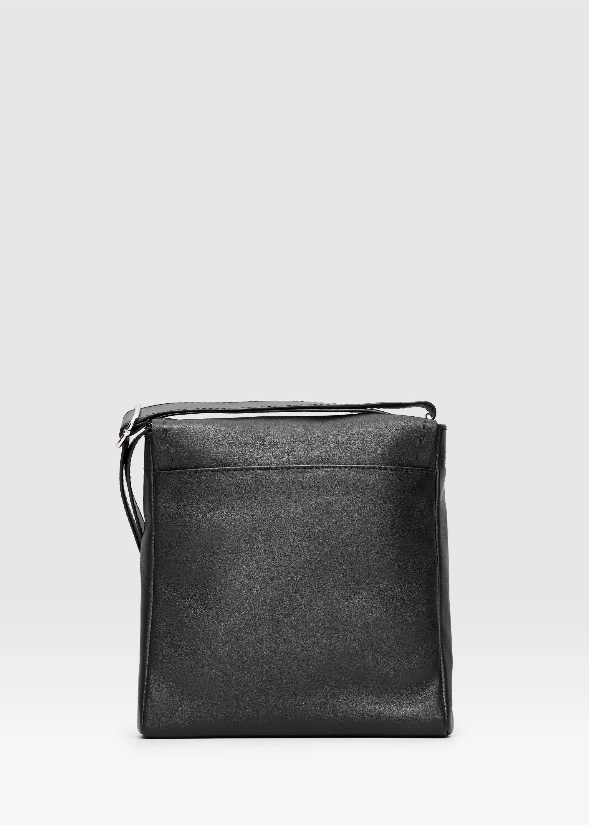 Back view of the Philini Anastasia Messenger Bag in black aniline nappa leather, square shape with adjustable leather strap. Sleek handcrafted leather crossbody purse