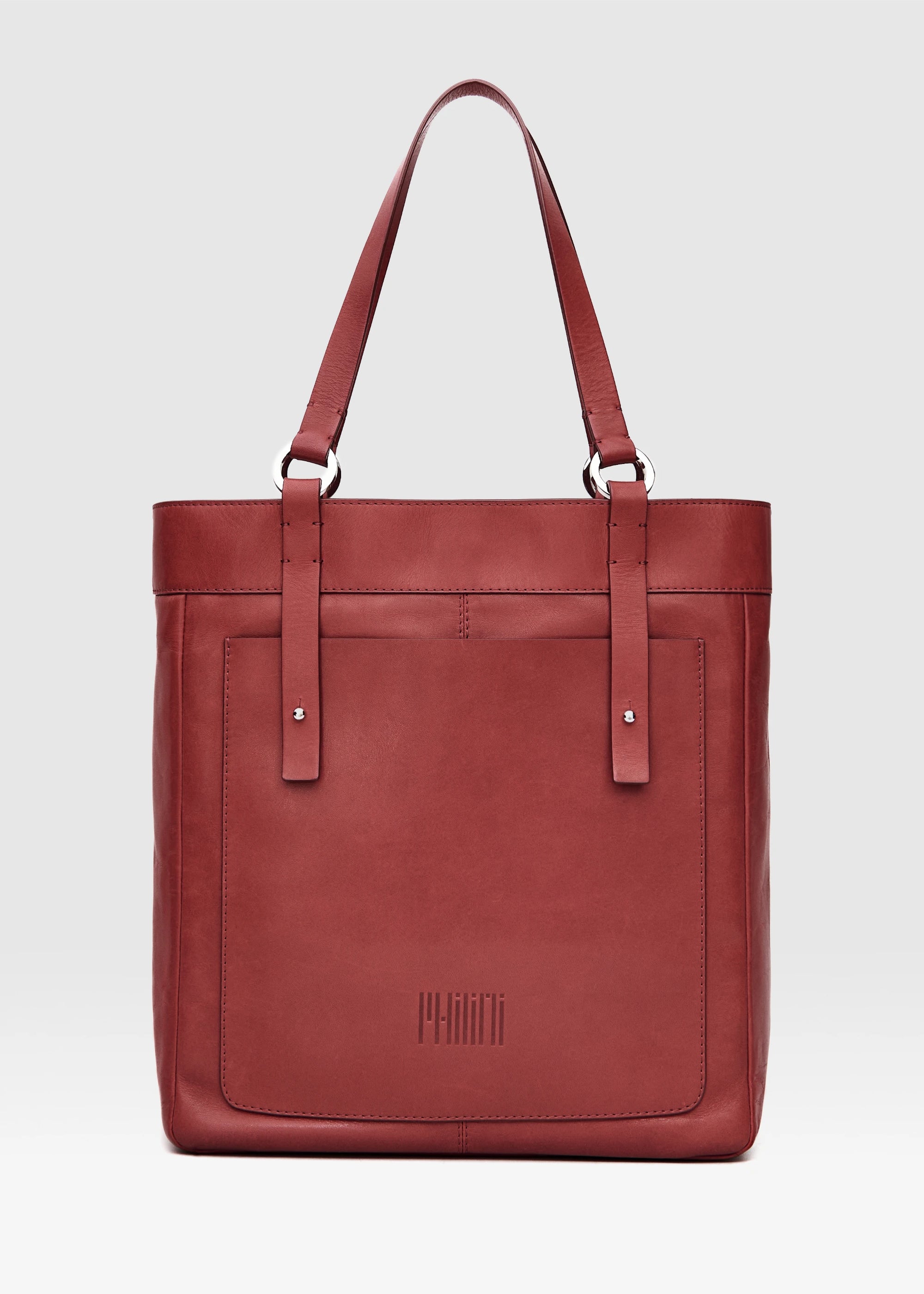 Front view of the Philini Elena Red Carry-All Shopper in full-grain leather with silver ring hardware and exterior pocket