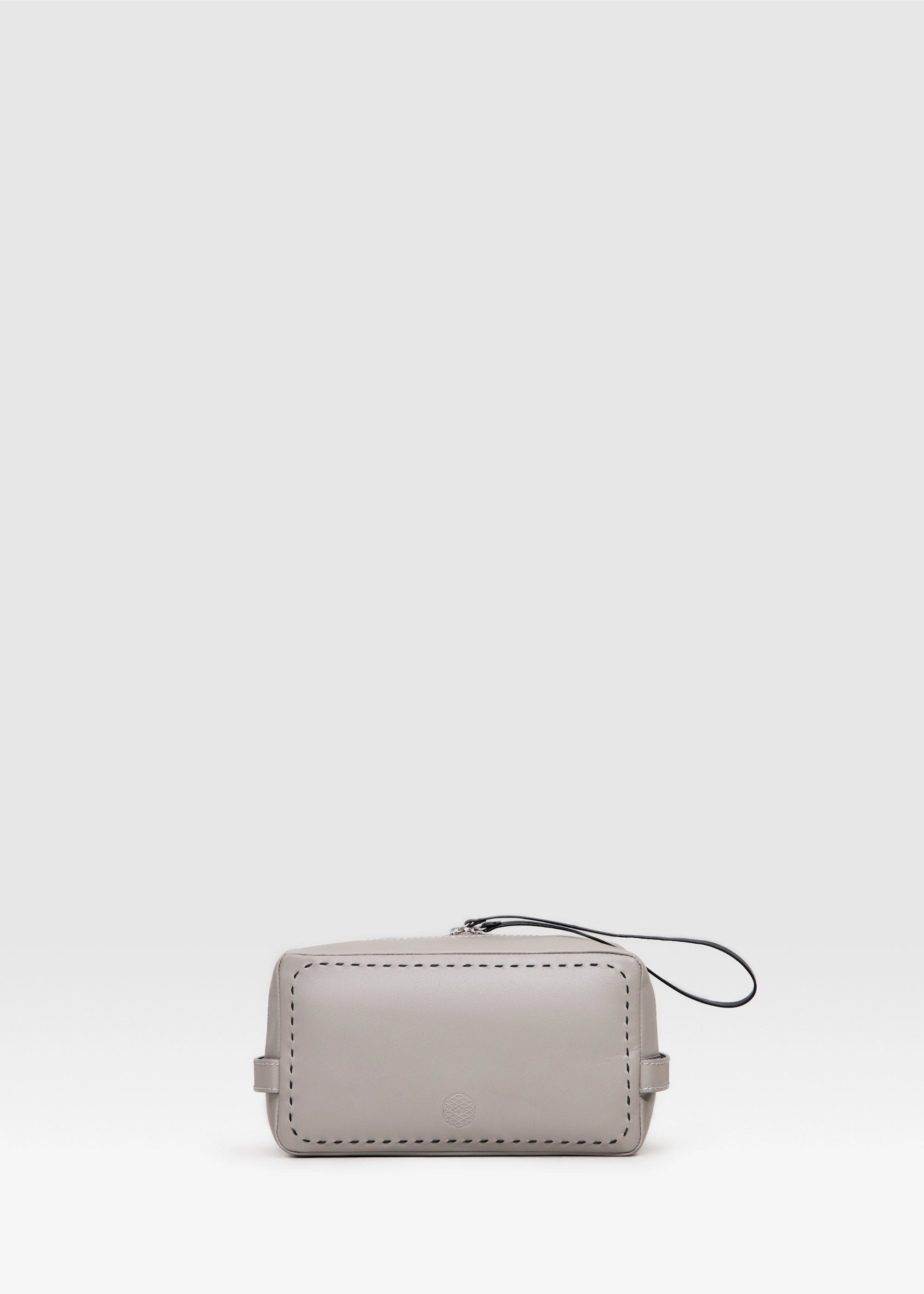 Front view of the Philini Magdalena Taupe Cosmetic Pouch in aniline leather with zip closure and short handles