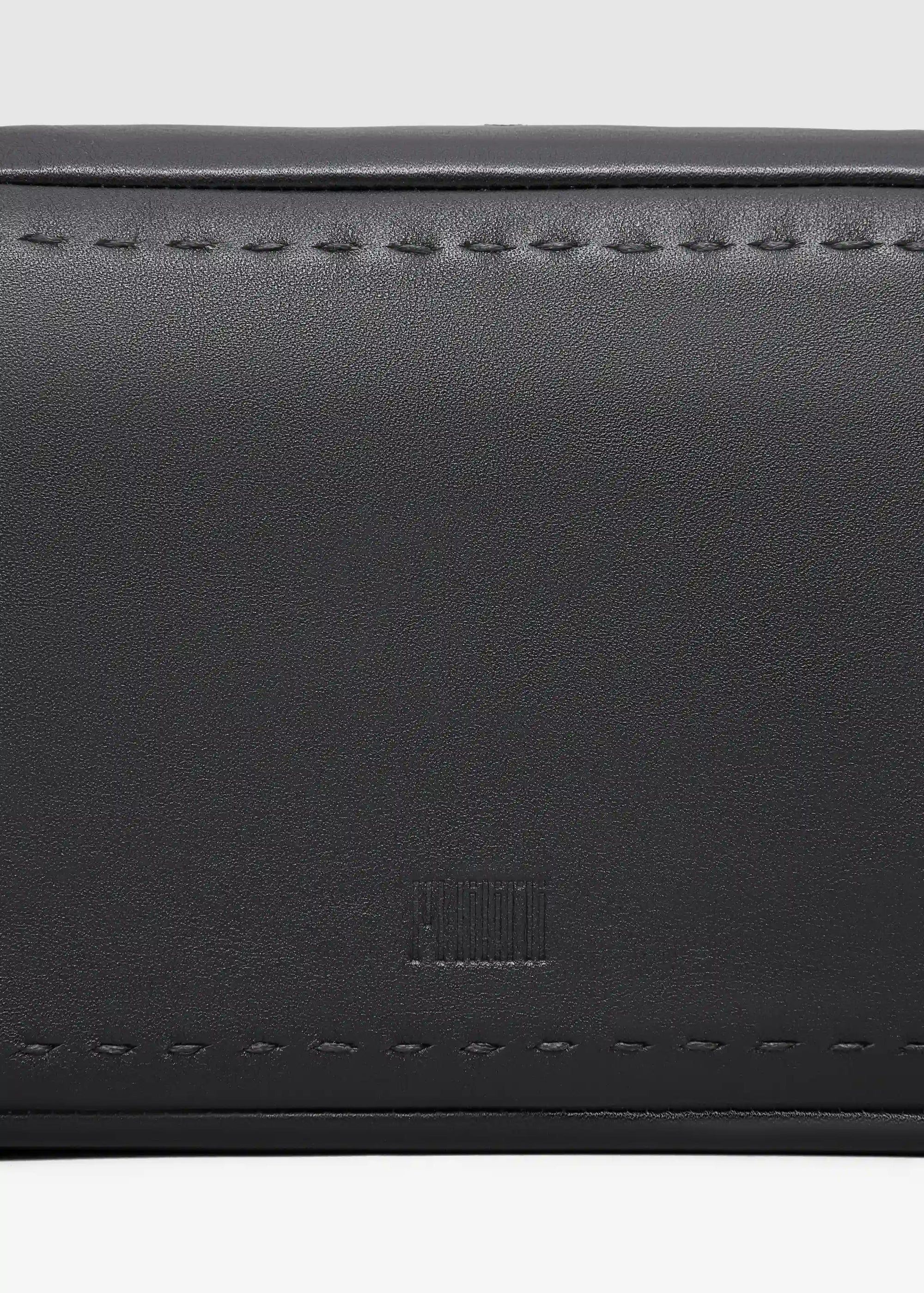 Close front view of the Philini Magdalena Pouch in black leather, rectangular design with two short handles, zip closure, hand-stitched edges, and stamped Philini logo—organiser for daily essentials.