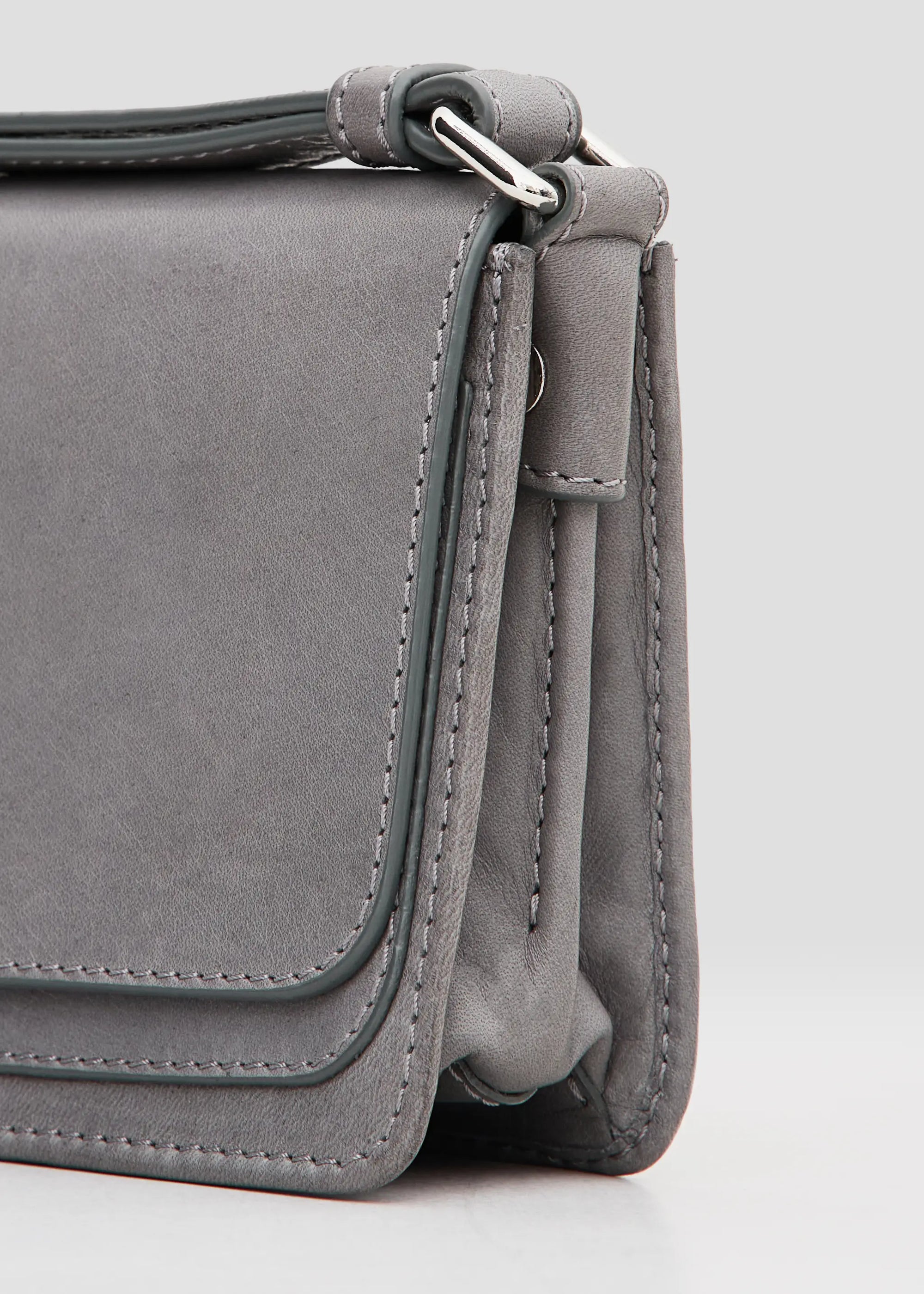 Close-up detailed view of the Philini Mihaela Wallet Bag in grey nappa leather highlighting handles.