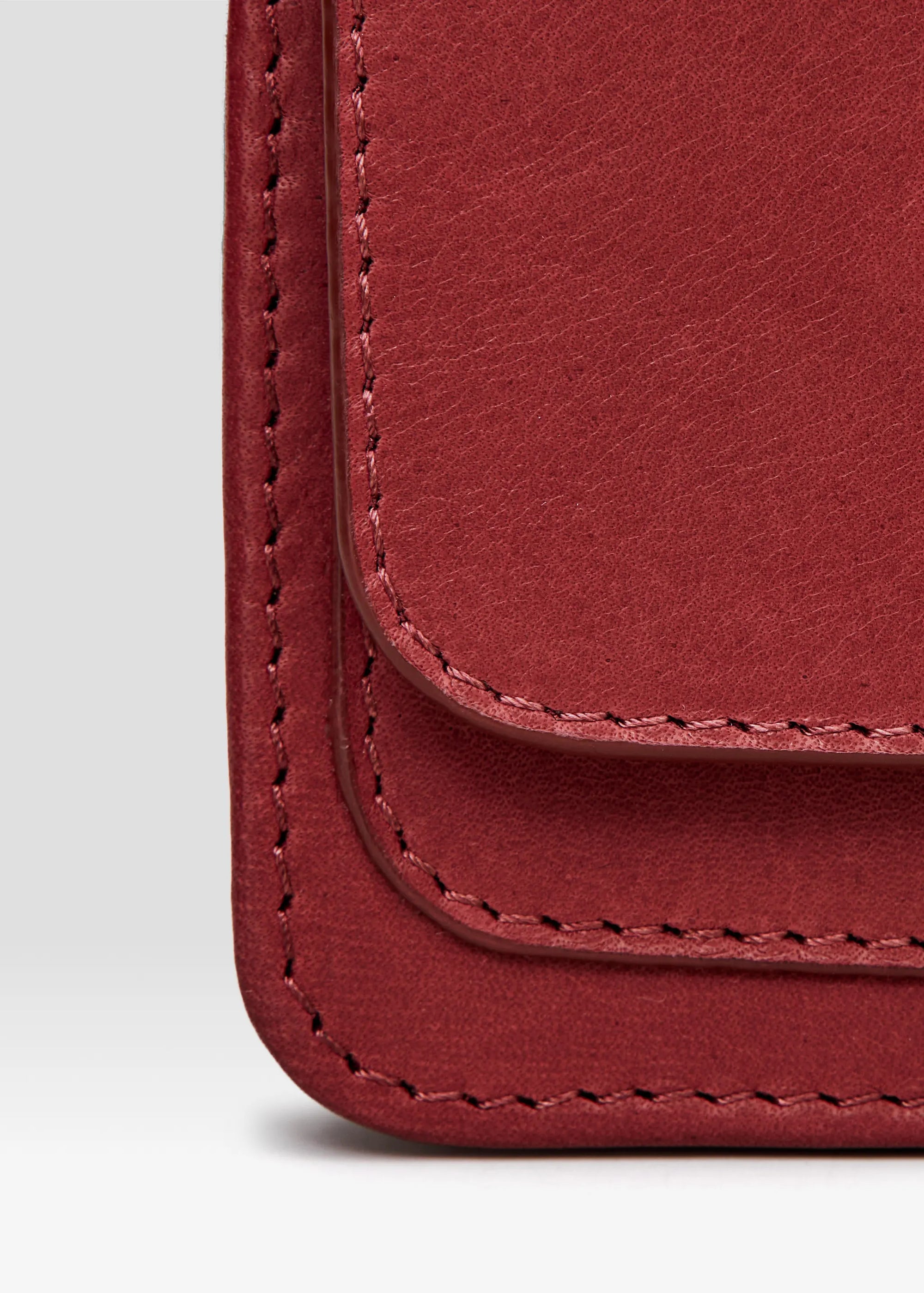 Close-up detailed front view of the Philini Mihaela Wallet Bag in red Nappa leather.