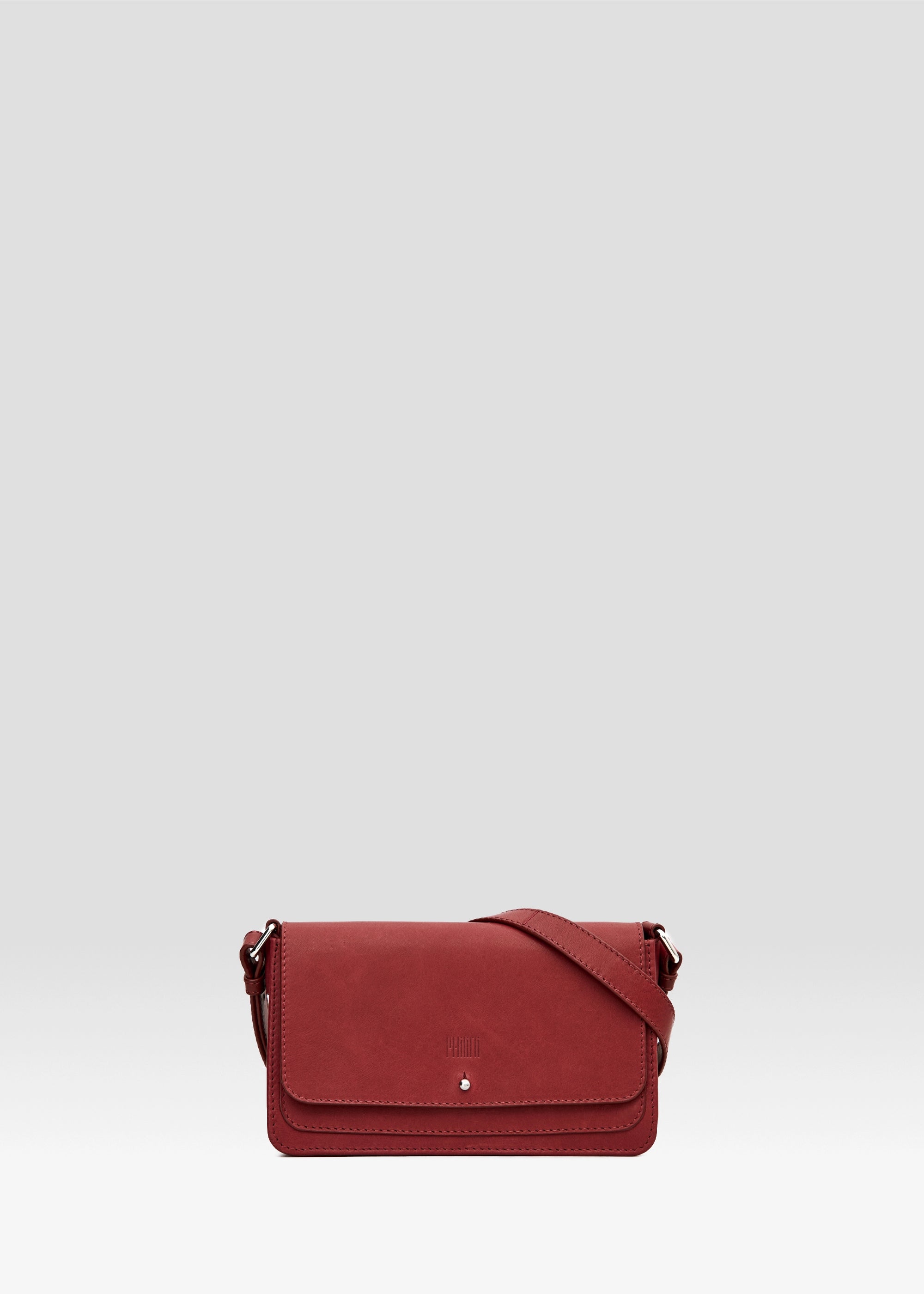 Front view of the Philini Mihaela Red Crossbody Wallet Bag in nappa leather with adjustable leather strap and silver cufflink closure