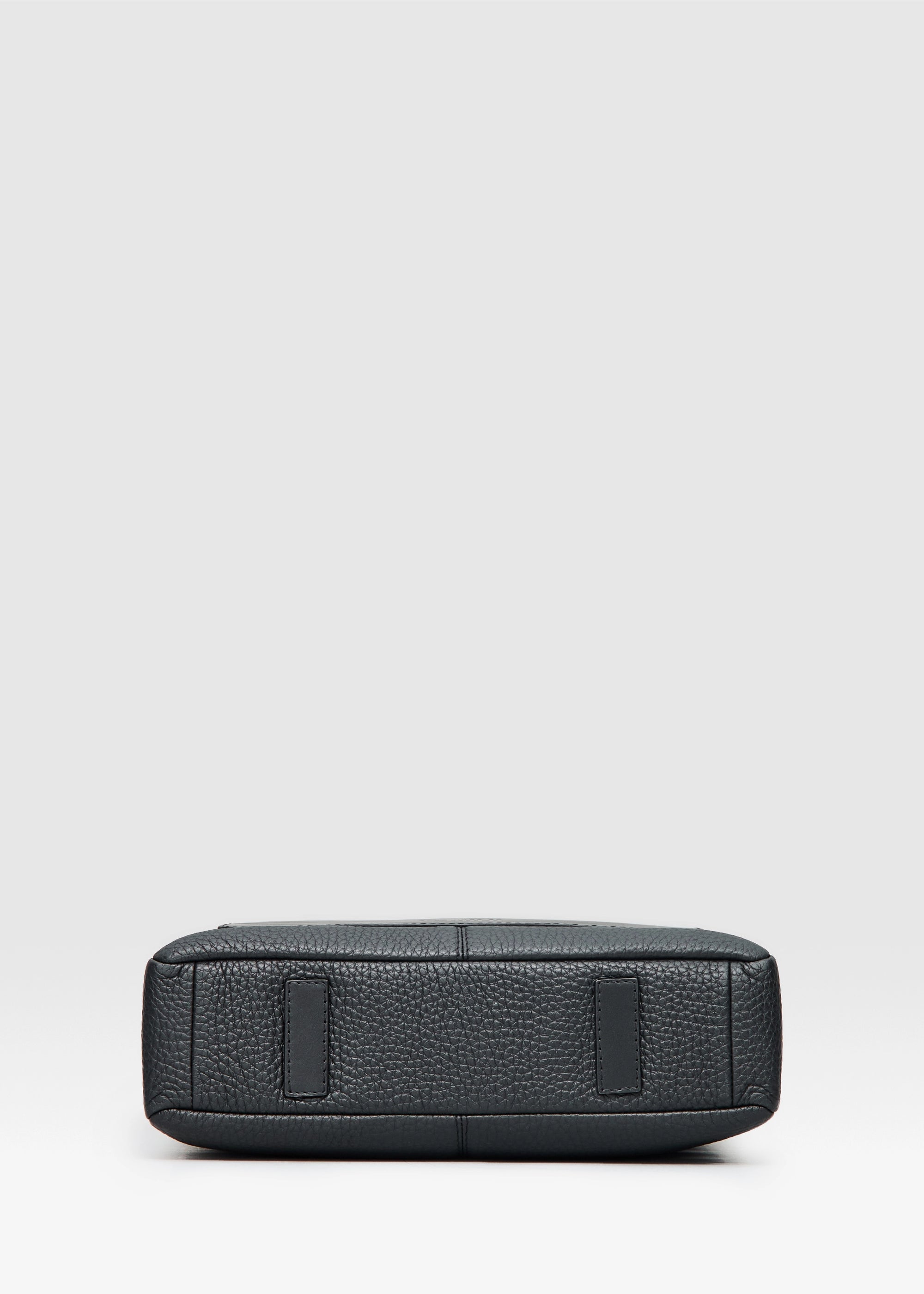 Bottom view of the Philini Andrea Bag in Black – A luxurious handmade leather tote bag crafted from premium full-grain and buffalo European leather. Has two small leather pads as its bottom feet. Ethically made for women who value sustainability and exclusivity.