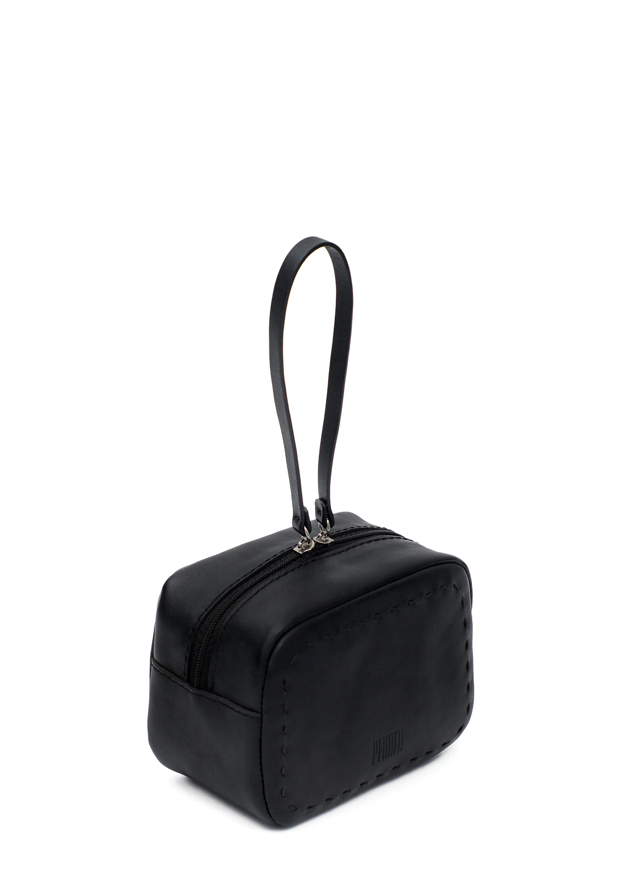 Side view of the Philini Anny Cosmetic Bag in black aniline leather, featuring a structured boxy shape, hand-stitched finish, and zip closure with leather pull. Ideal for organizing daily essentials.