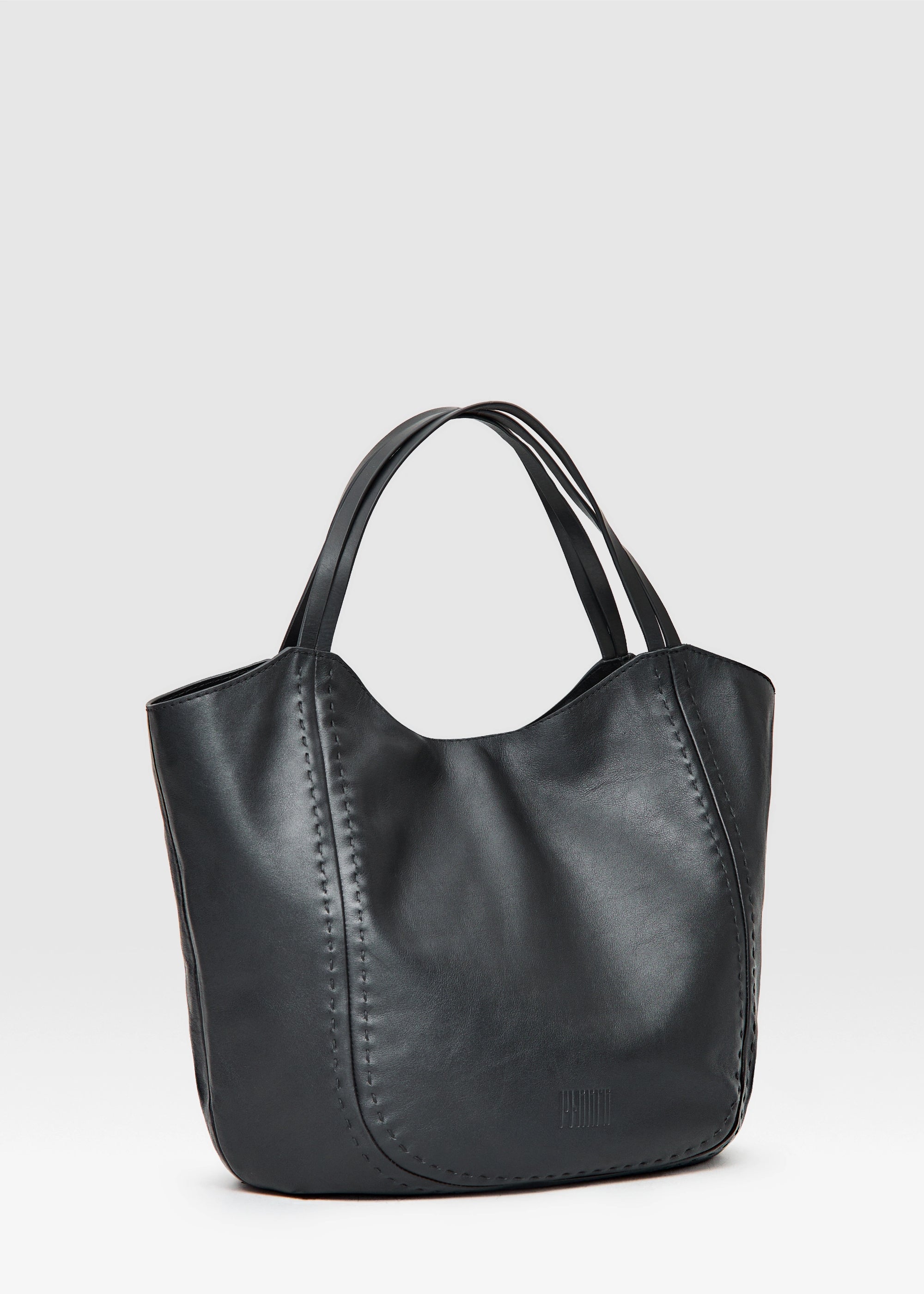 Side View of Black leather handbag  Charlotte from Philini bags on a light gray background