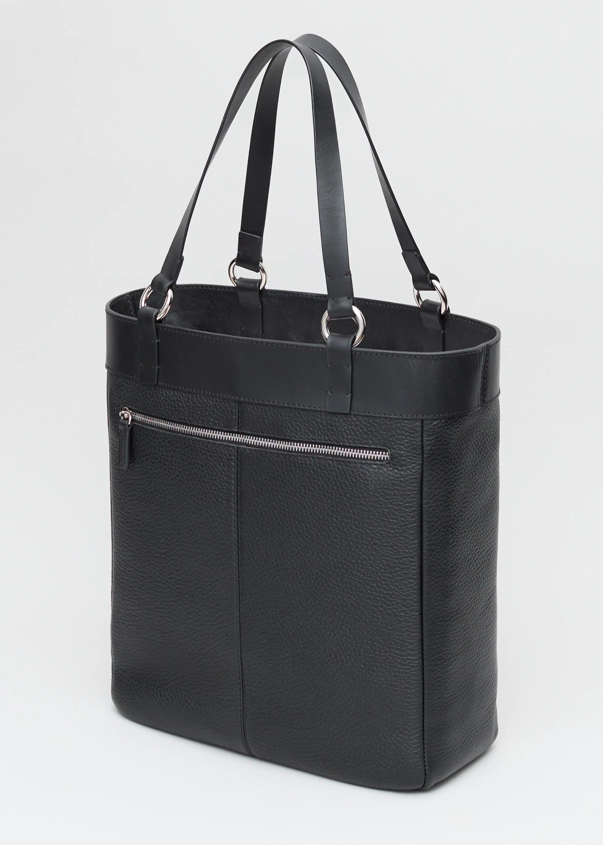 Back view of the Philini Elena Black Tote Bag, showcasing a zipper pocket, premium leather construction, and silver details on the leather handles 