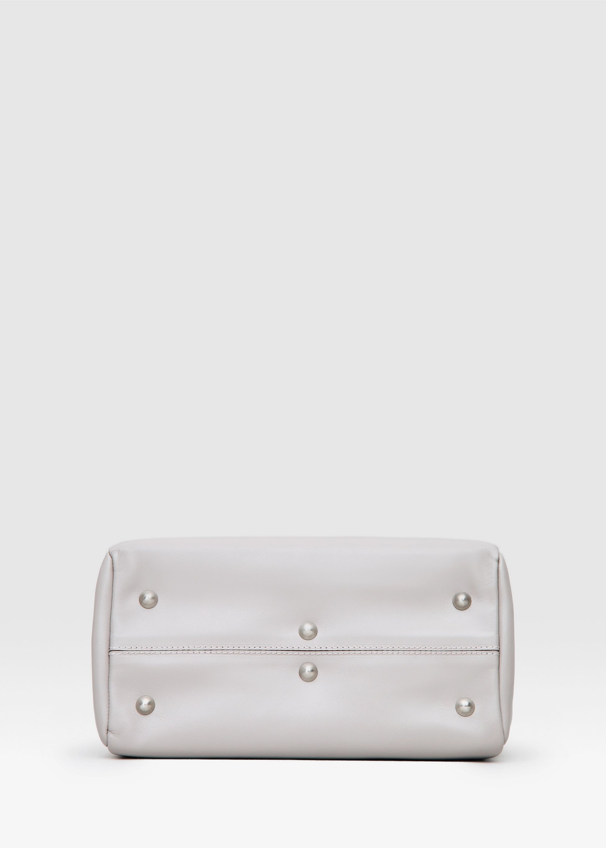Bottom view of the Philini Kathy Taupe Business Bag in aniline calf leather with flat handles and front flap pocket