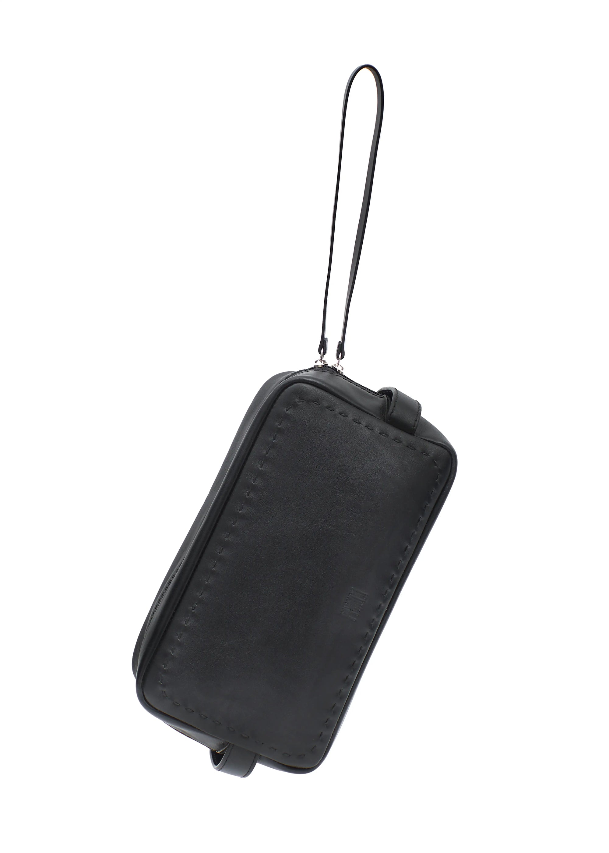 Front view of the Philini Magdalena Pouch in black leather, rectangular silhouette. Compact black travel pouch, stylish makeup organizer for everyday essentials