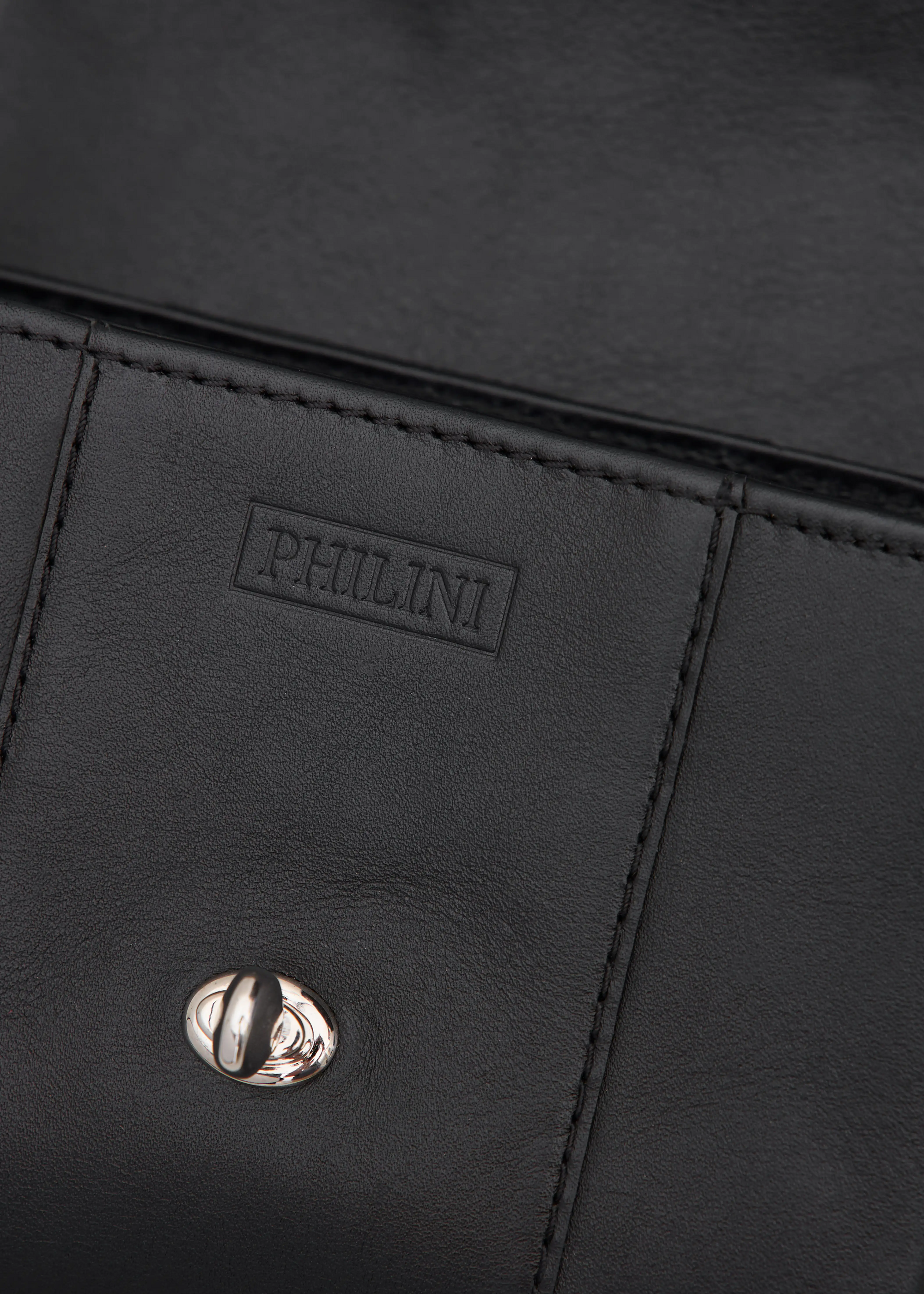 Close front view of the Philini Marina Mini Crossbody Bag showing front flap with silver clasp