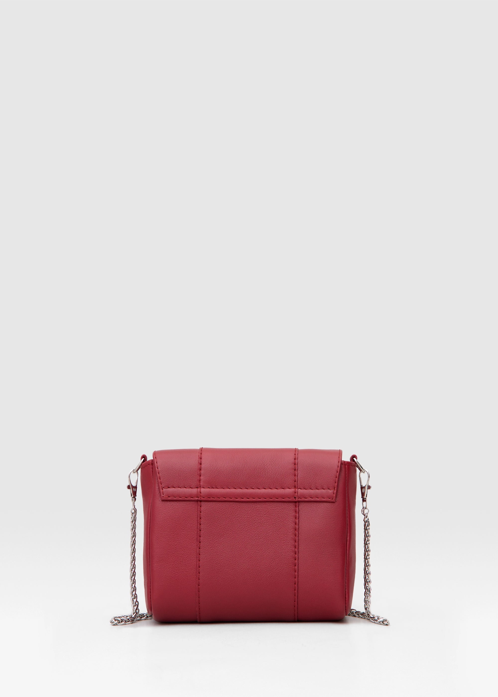 Back view of the Philini Marina Mini Crossbody Bag in red nappa leather, rectangular silhouette with front flap and silver chain shoulder strap. Elegant handcrafted mini handbag 