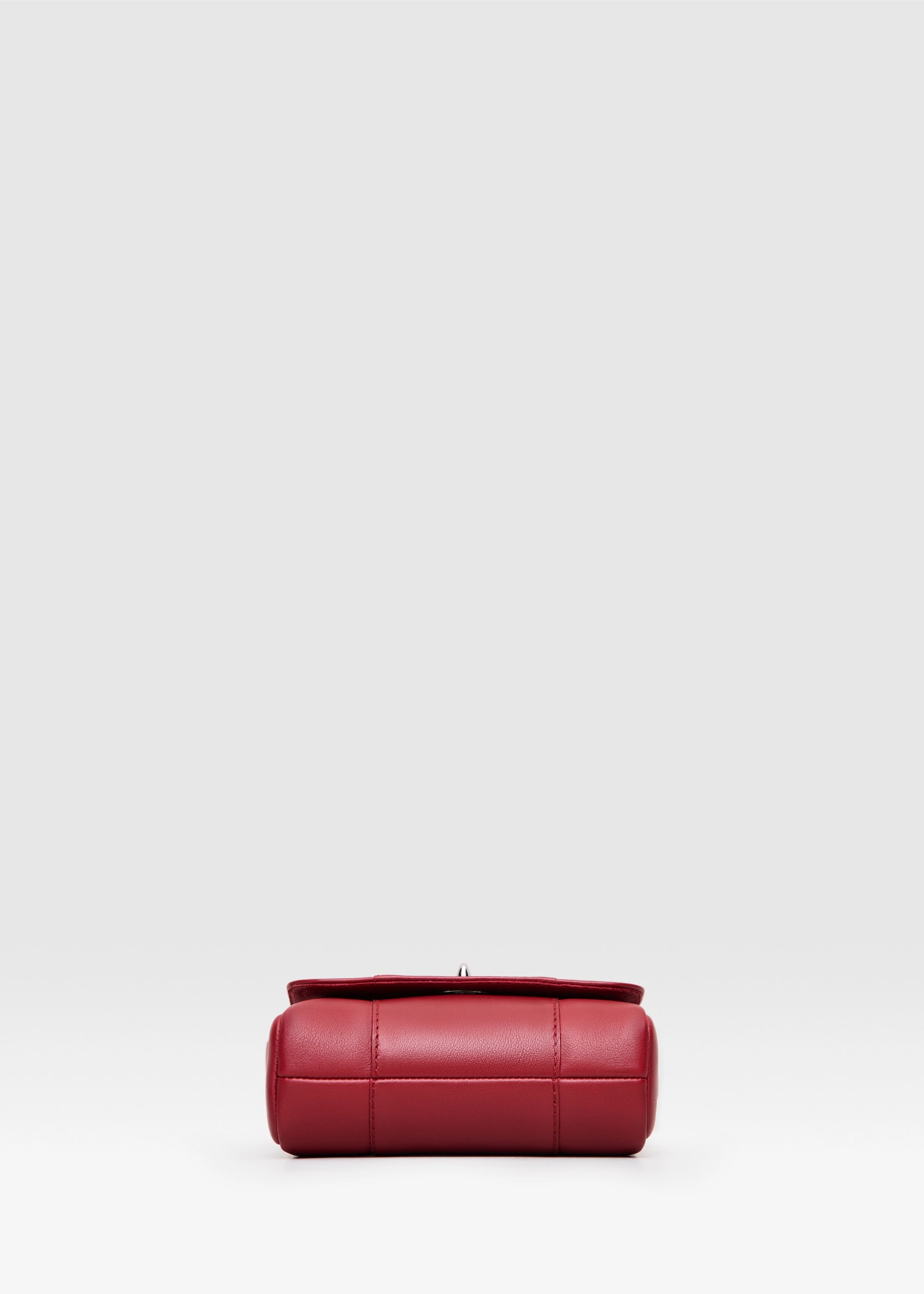 Bottom view of the Philini Marina Red Chain Crossbody Bag in calf leather with silver chain strap and clasp closure