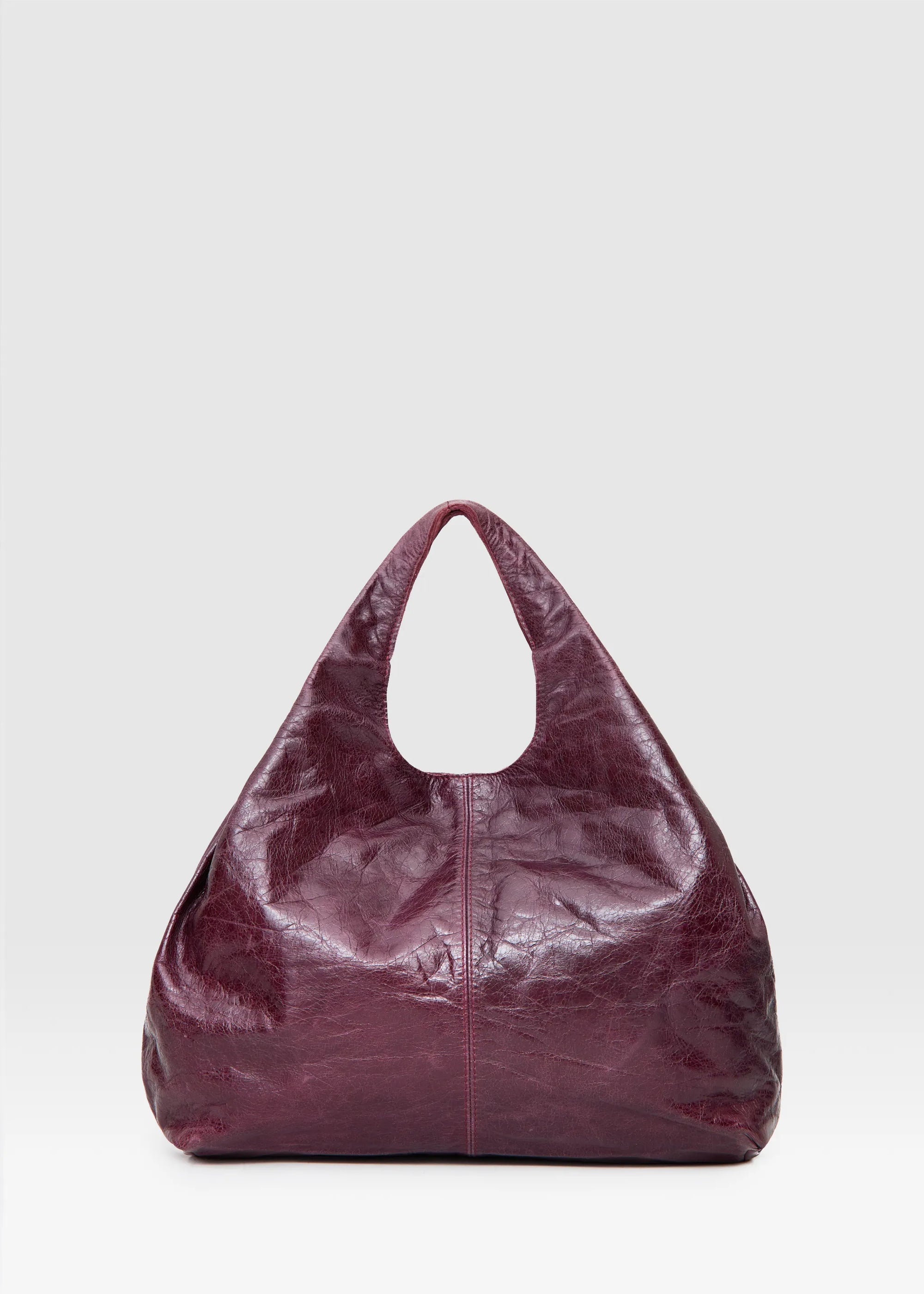 Back view of the Philini Melanie Burgundy Hobo Bag in soft calf leather with detachable strap and dual handles