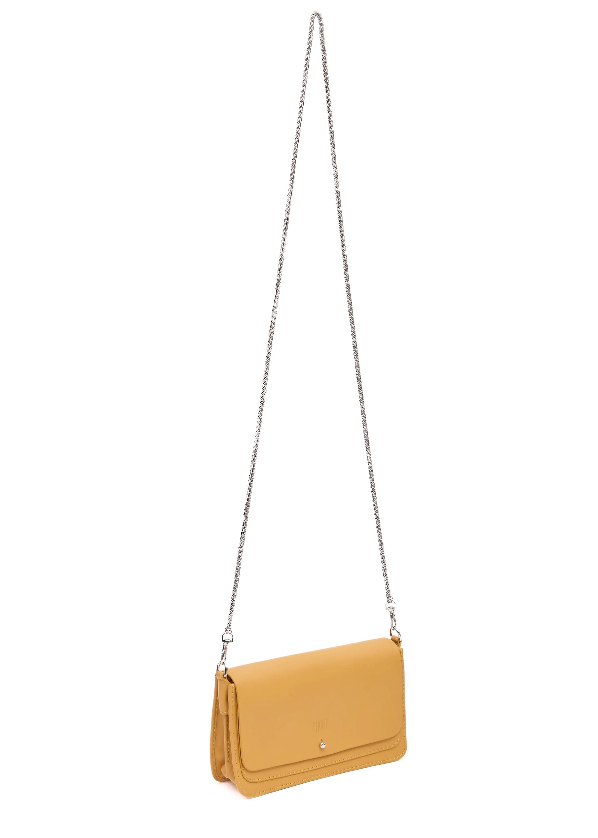 Side view of the Philini Mihaela Wallet Bag in yellow nappa leather, featuring rectangular shape, a front flap with silver cufflink closure, accordion sides, and a long metal chain handle. Compact, refined wallet bag for women, featuring minimalist design and crafted for conscious luxury style.