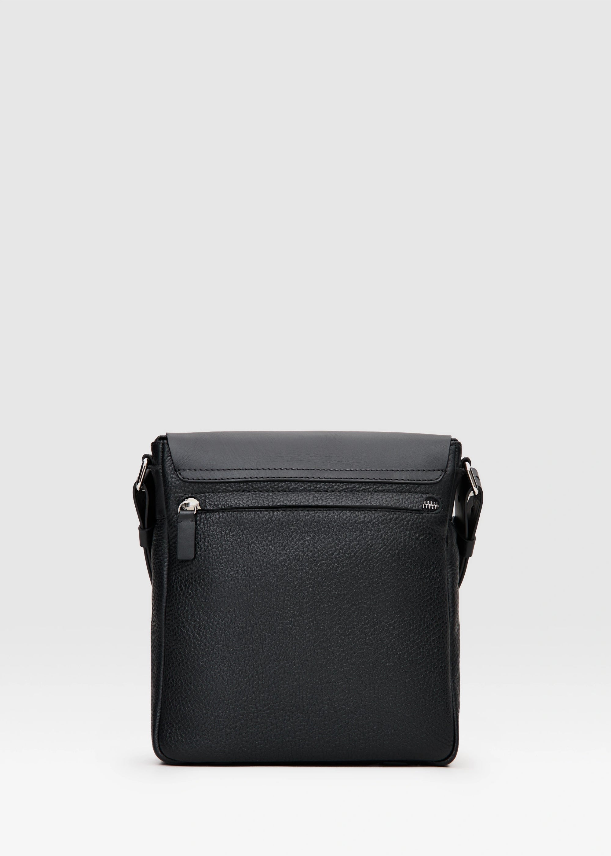 Back view of the Philini Black Leather Messenger Bag, featuring a slightly square design with a hidden zipper pocket covered by leather. A handcrafted, sustainable luxury leather bag