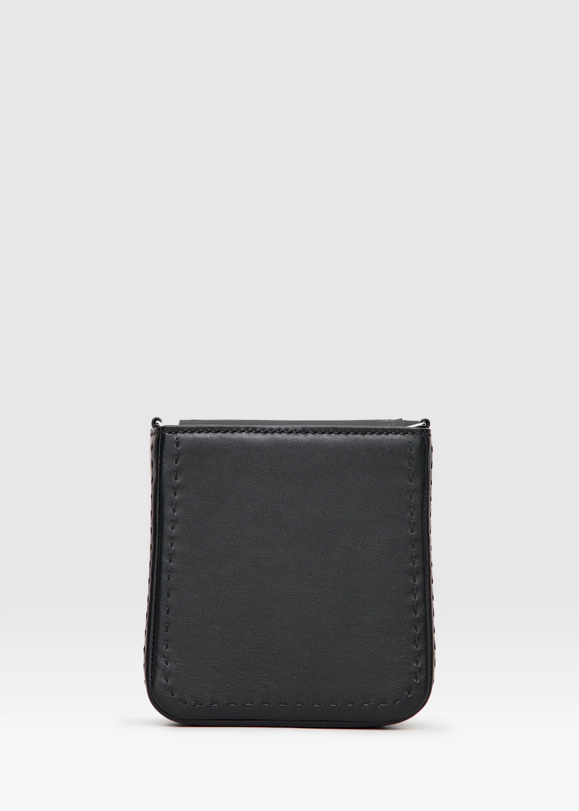 Back View of Elegant black handbag combining buffalo &amp; full-grain leather. Features dual zipper compartments, short handles &amp; silver details. Handcrafted by Philini.