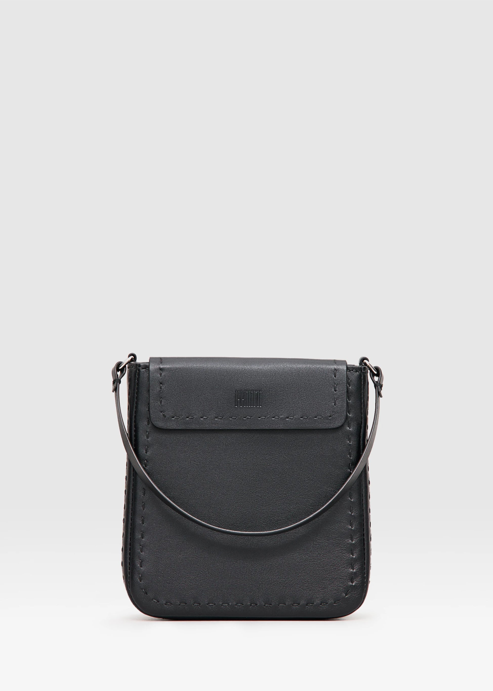 Elegant black handbag combining buffalo & full-grain leather. Features dual zipper compartments, short handles & silver details. Handcrafted by Philini.