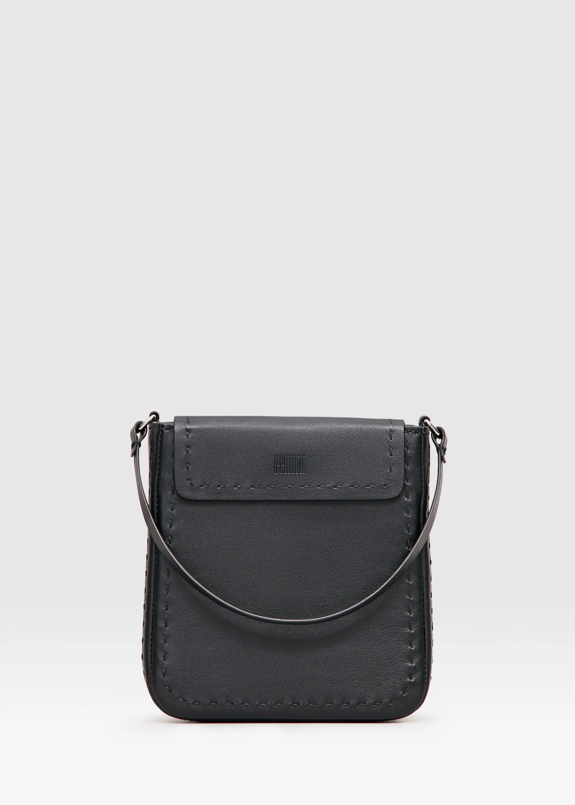 Elegant black handbag combining buffalo & full-grain leather. Features dual zipper compartments, short handles & silver details. Handcrafted by Philini.
