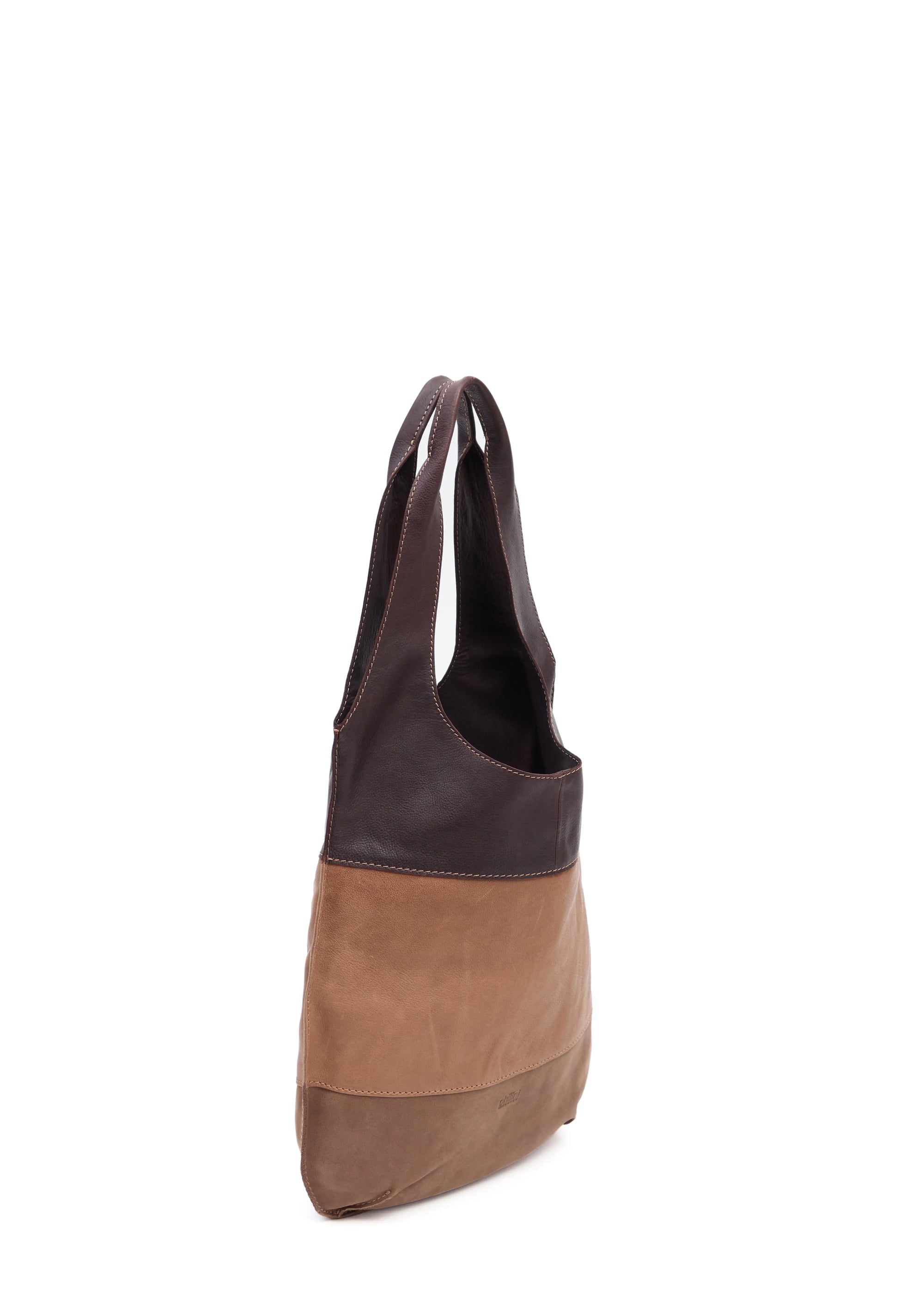 Side view of the Philini Semfira Hobo Bag in warm-toned nubuck and calf leather, two integrated handles, soft curved edges, and stamped logo. Earthy-toned designer handbag