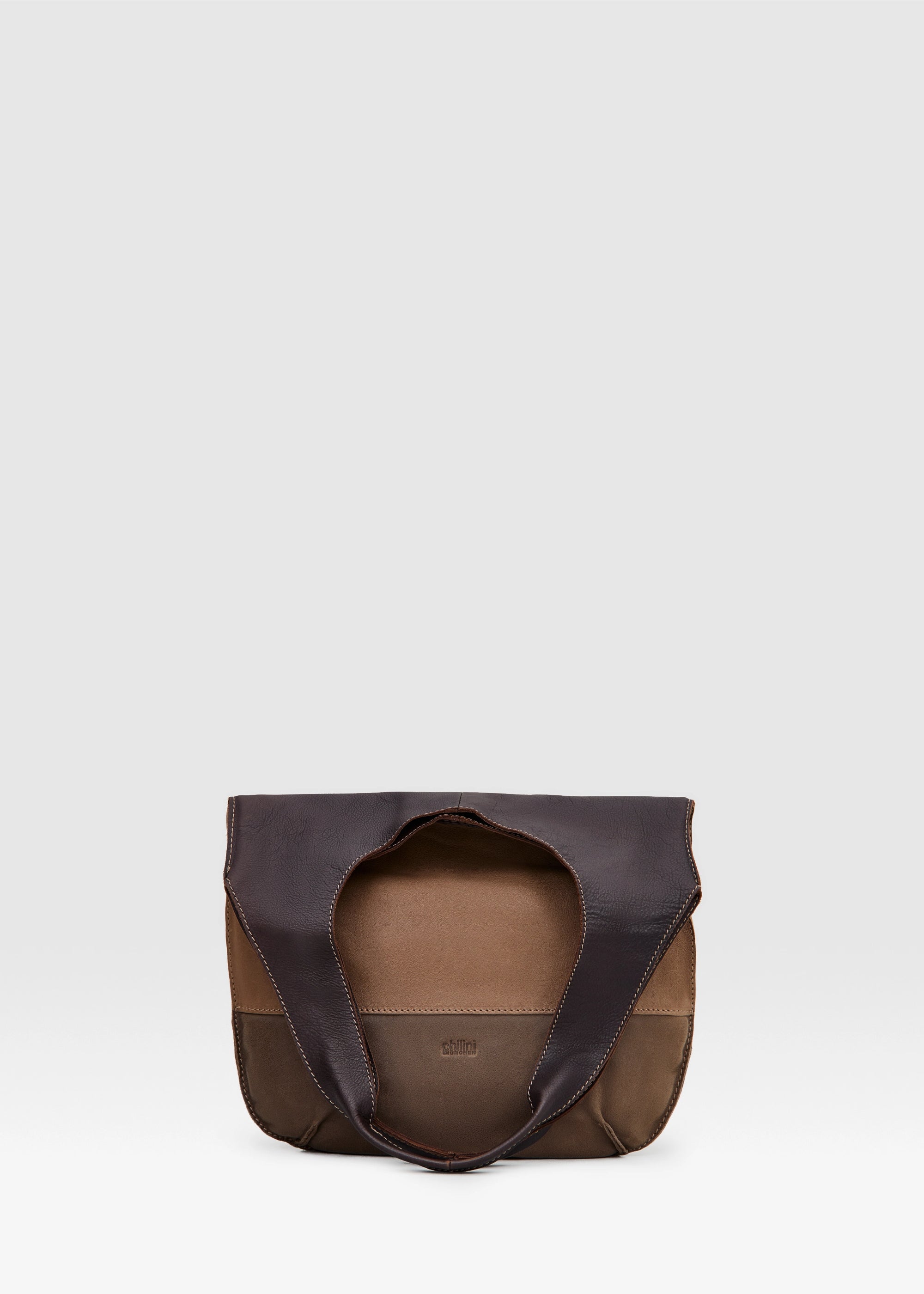 Folded view of the Philini Semfira Hobo Bag in soft brown nubuck and calf leather, focusing on the texture interplay, earth-toned straps, and detailed craftsmanship. Designed and luxury warm-toned suede-leather hobo