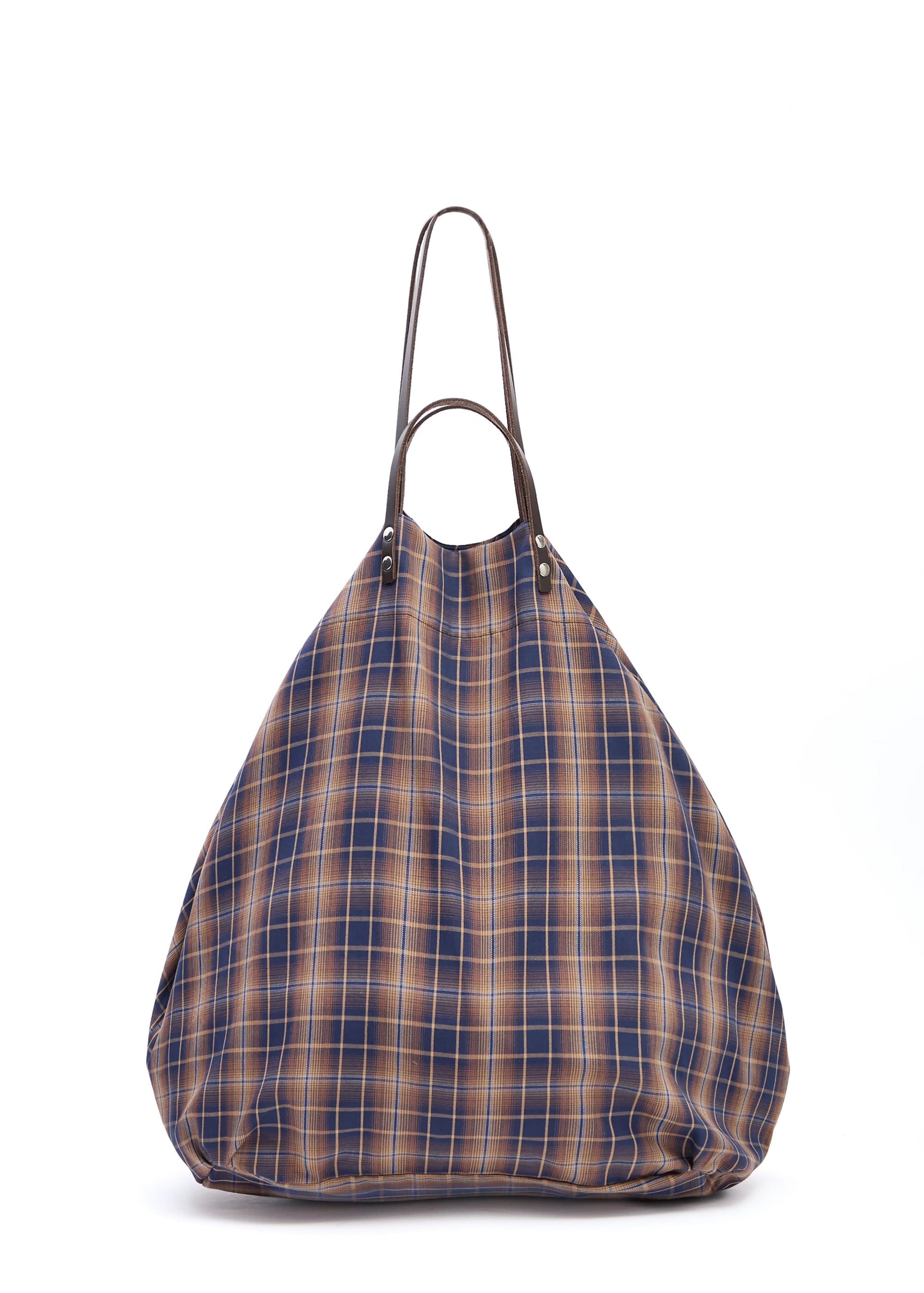 Back view of the Philini Shopper in checkered brown cotton, showcasing short and long brown leather handles with silver hardware and top button closure. Handcrafted roomy everyday bag