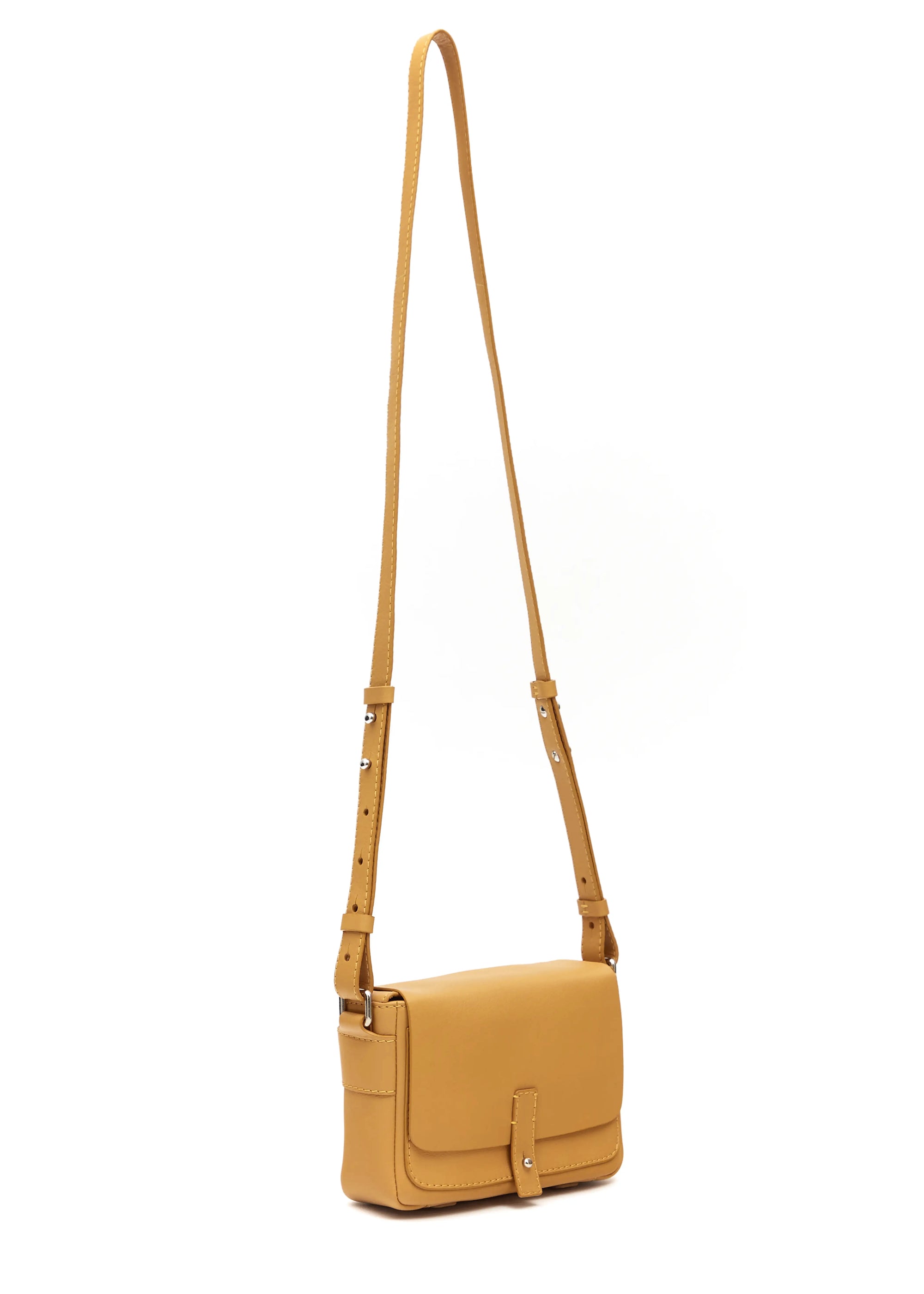 Side view of the yellow Philini Whitney Mini Crossbody Bag in nappa leather, with vertical design, silver hardware, and flap closure. A compact handcrafted bag for everyday style and modern elegance