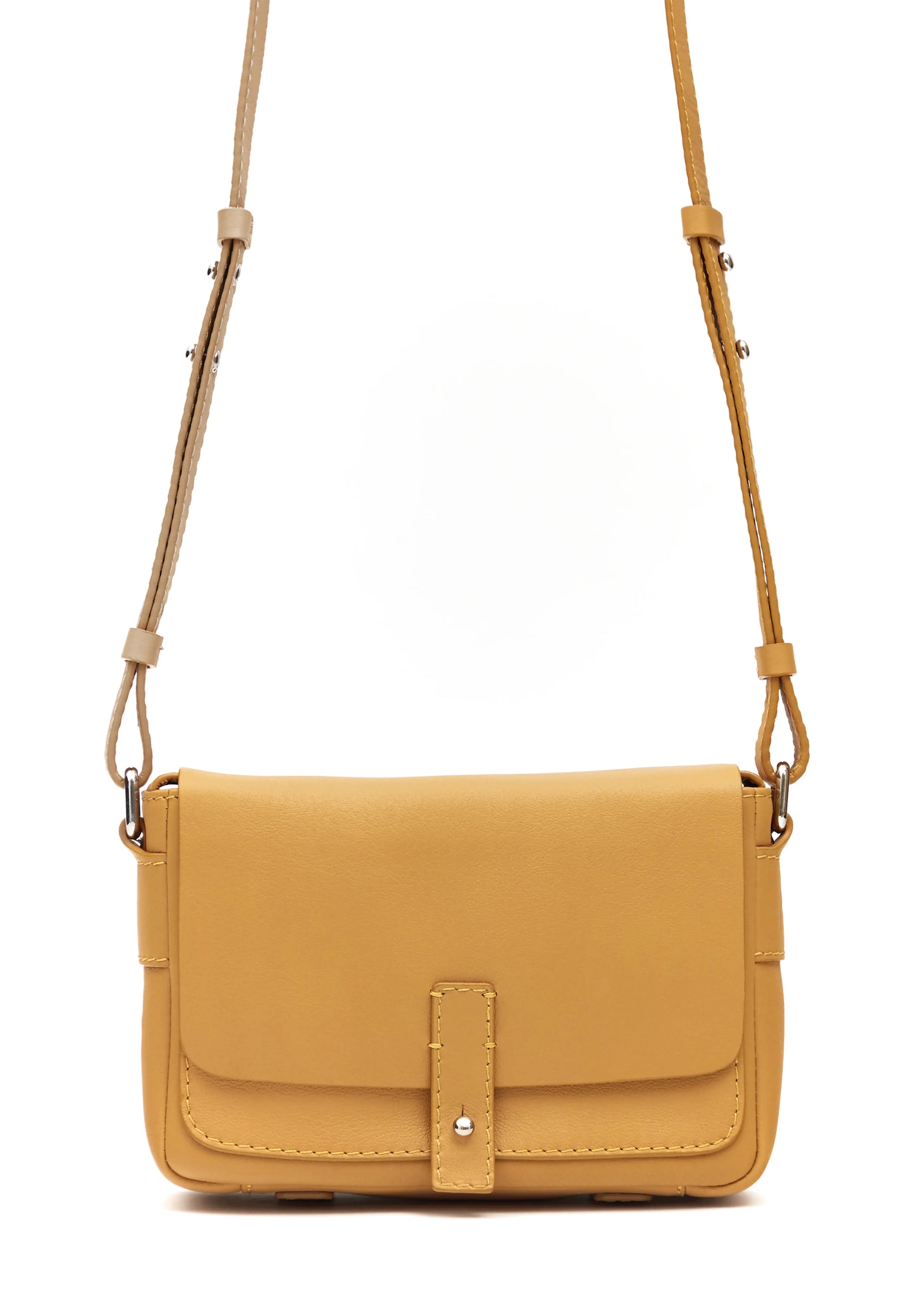 Close front view of the Philini Whitney Mini Crossbody Bag in yellow nappa leather, highlighting its vertical rectangular shape, front flap with silver cufflink closure, and adjustable leather strap with silver hardware. With the addition hand stitches