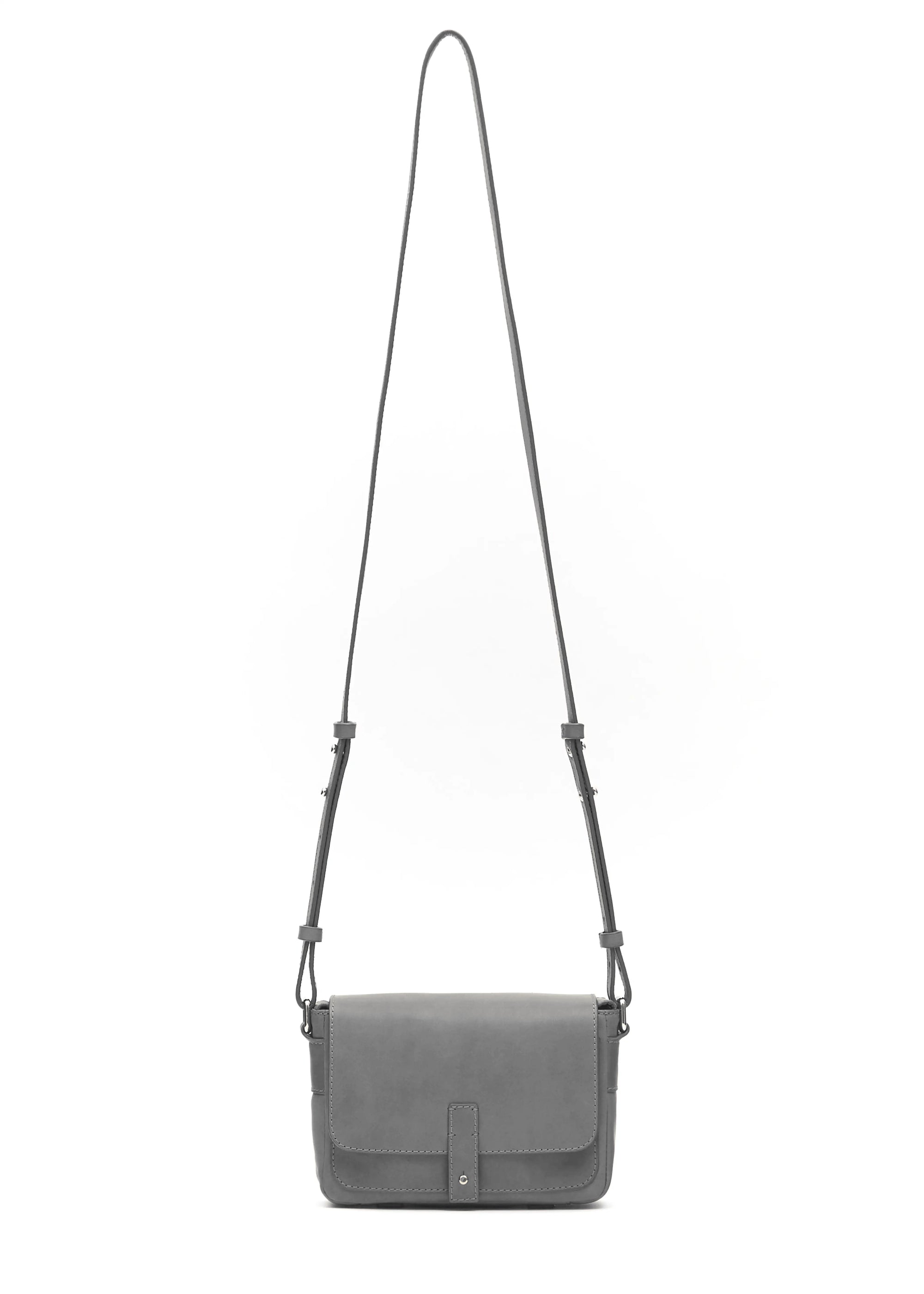 Front view of the Philini Whitney Grey Mini Crossbody Bag in nappa leather with adjustable strap and silver cufflink closure