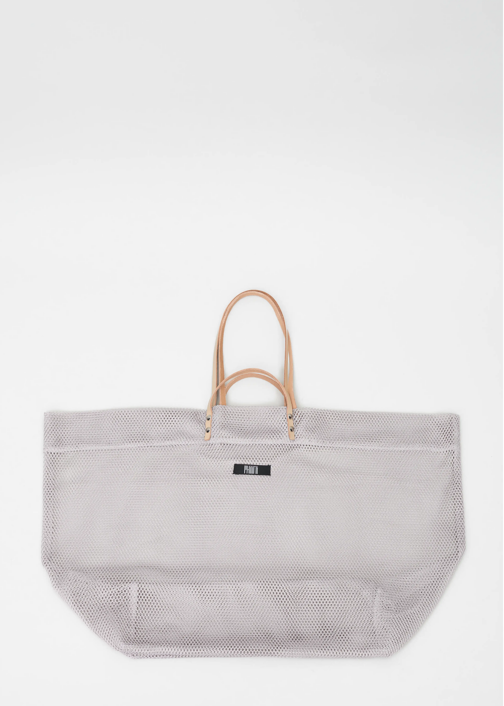 Top view of the Mesh Shopper,  featuring short and long calf leather handles